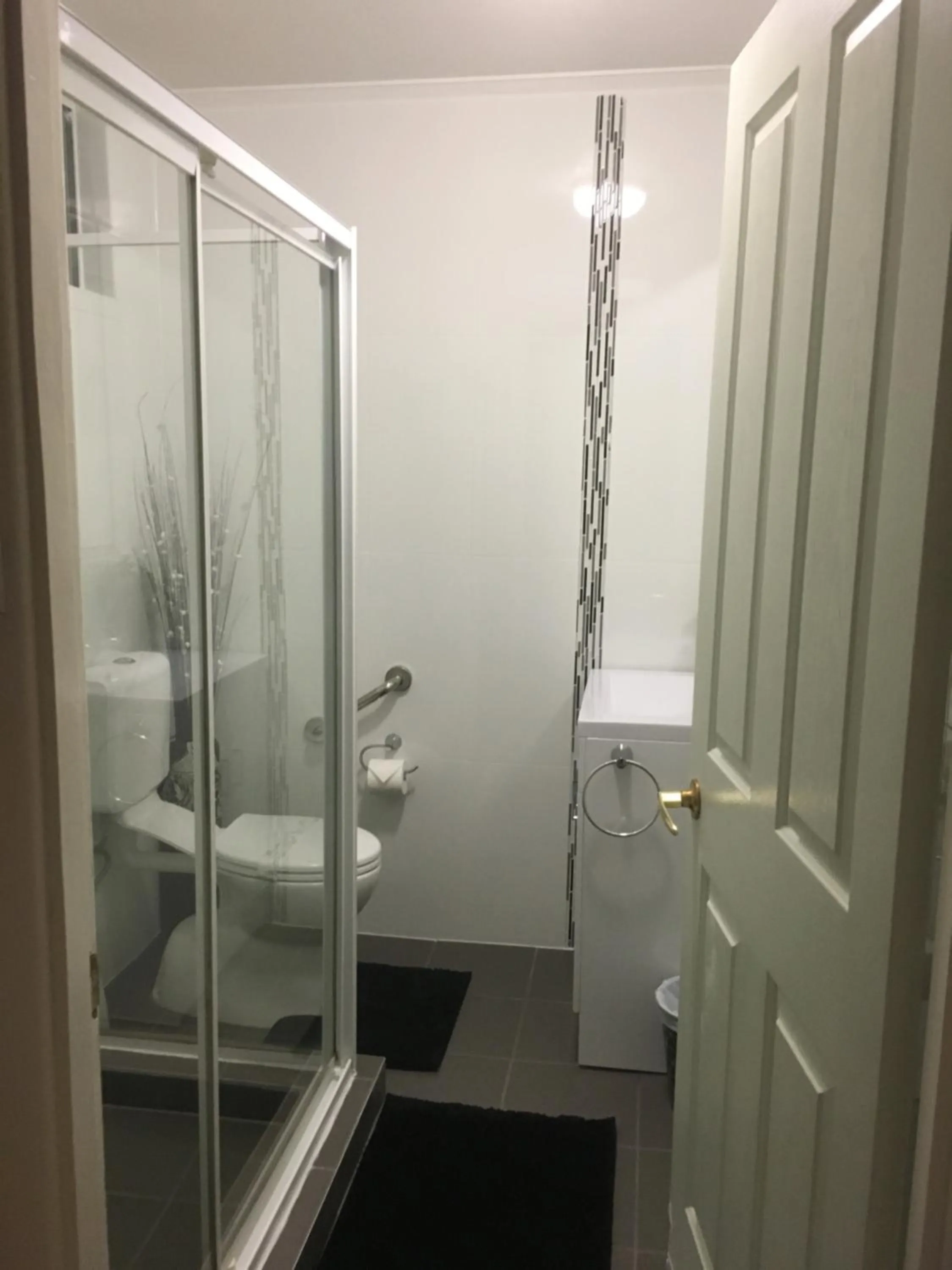 Shower in Beachlander Self-Contained Holiday Apartments