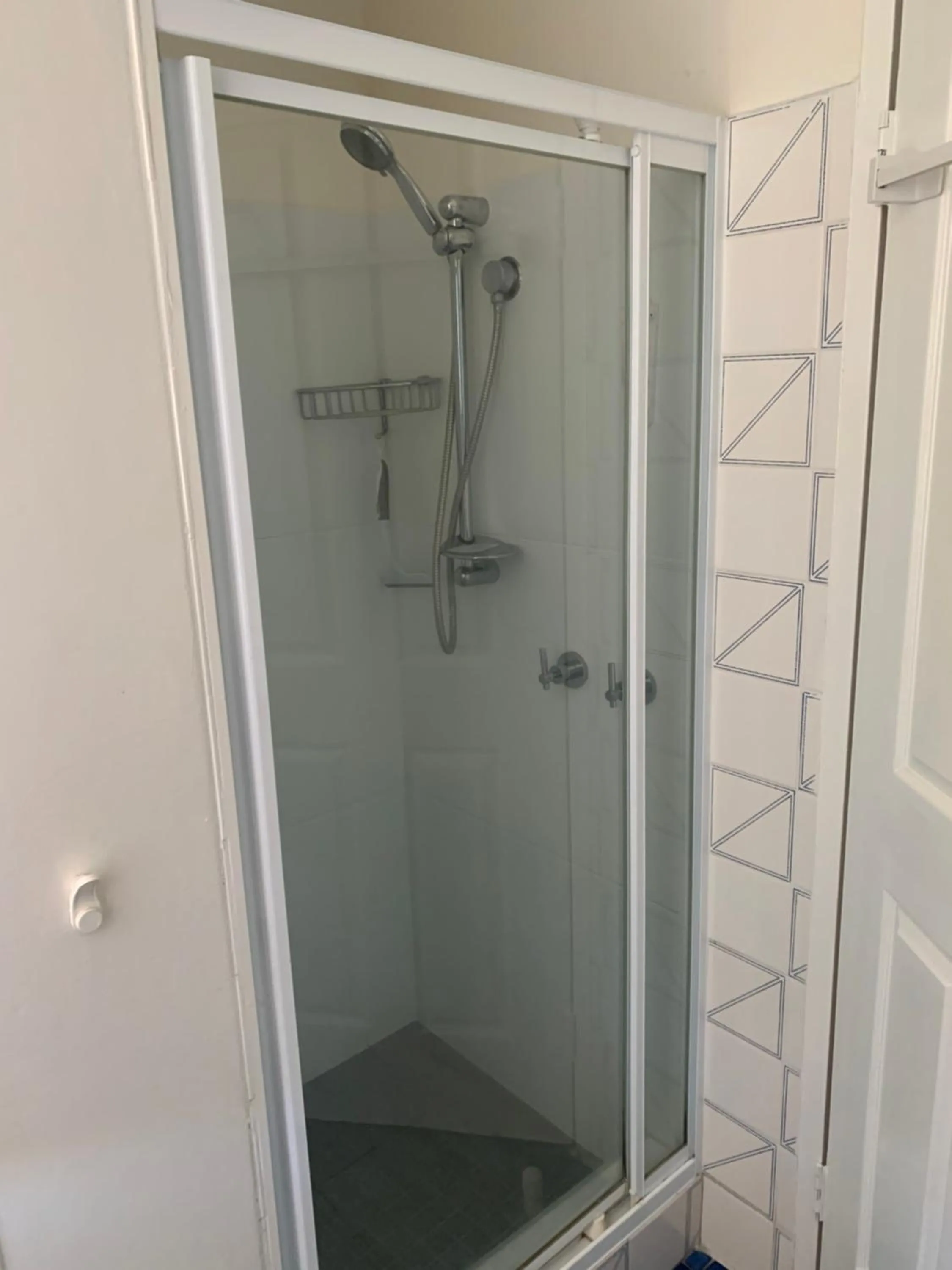 Shower in Beachlander Self-Contained Holiday Apartments