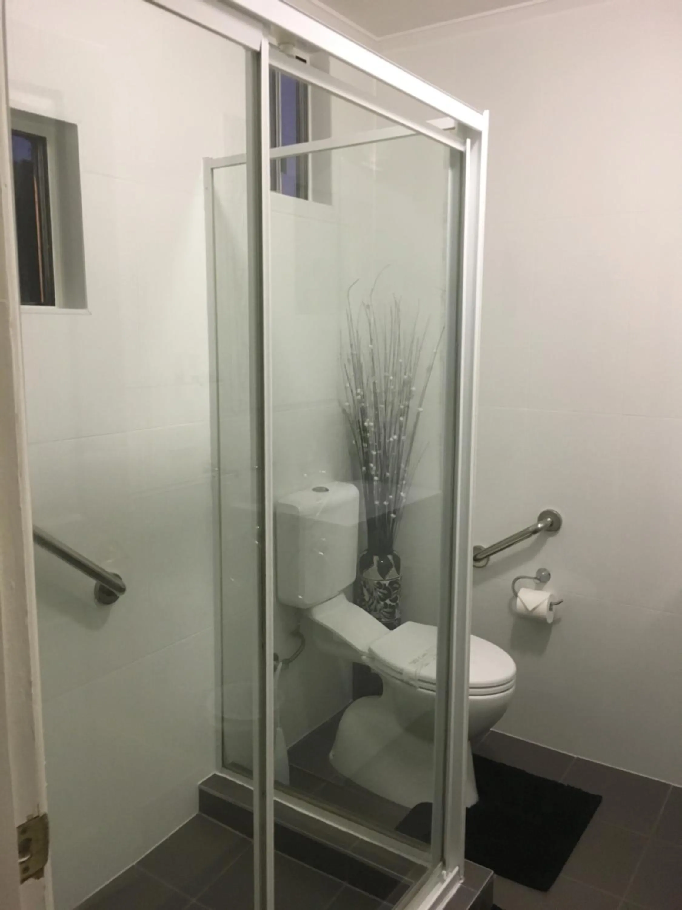 Shower in Beachlander Self-Contained Holiday Apartments