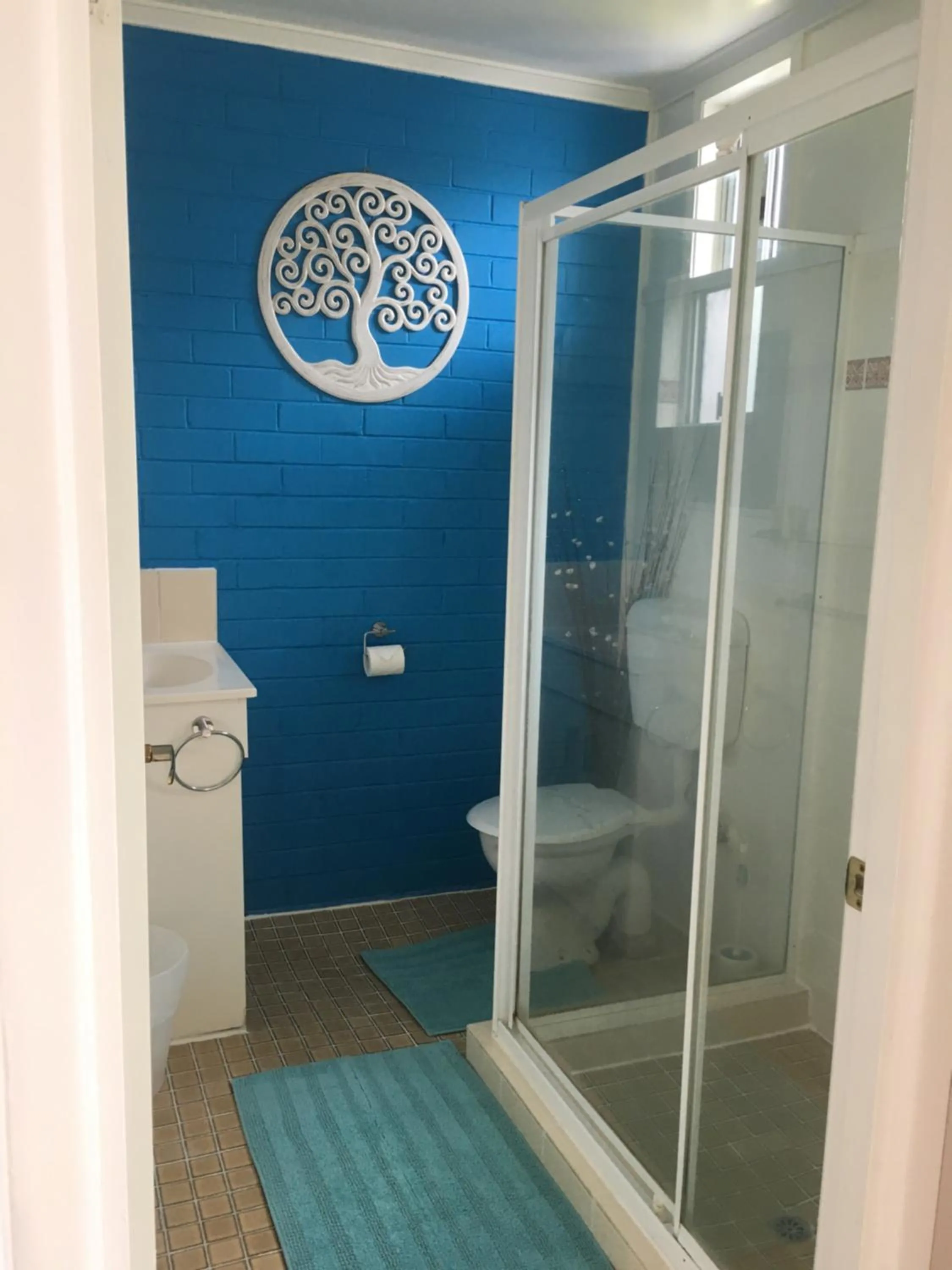 Shower in Beachlander Self-Contained Holiday Apartments