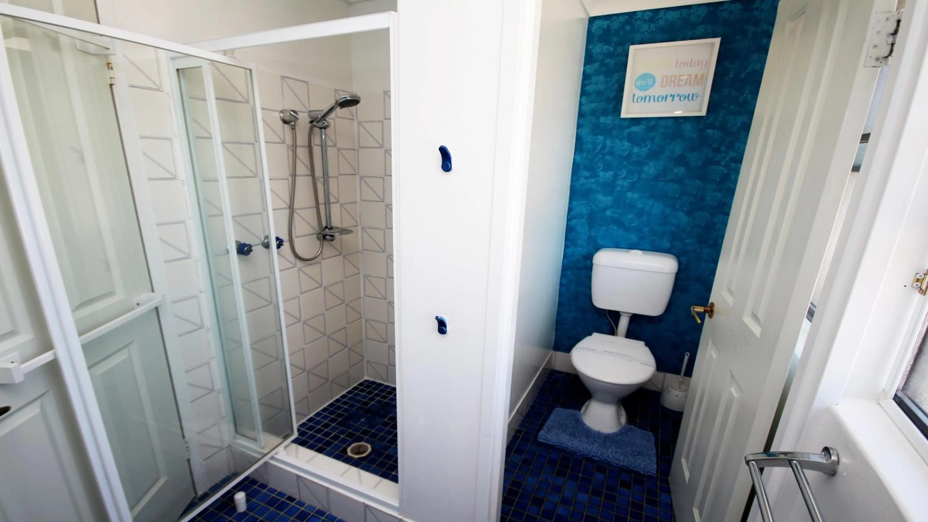 Shower in Beachlander Self-Contained Holiday Apartments