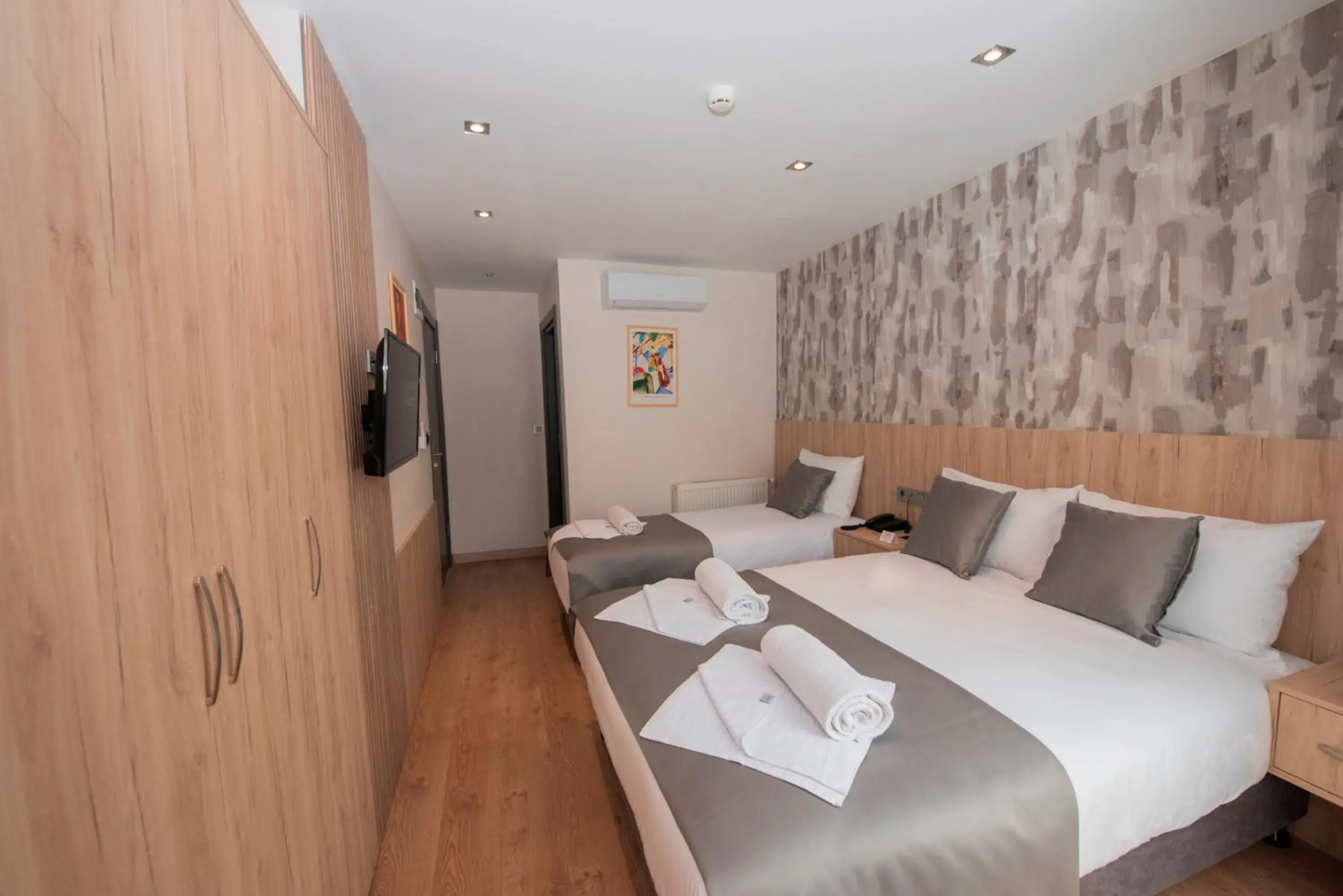 Bed in Mahya Hotel Bed in Mahya Hotel