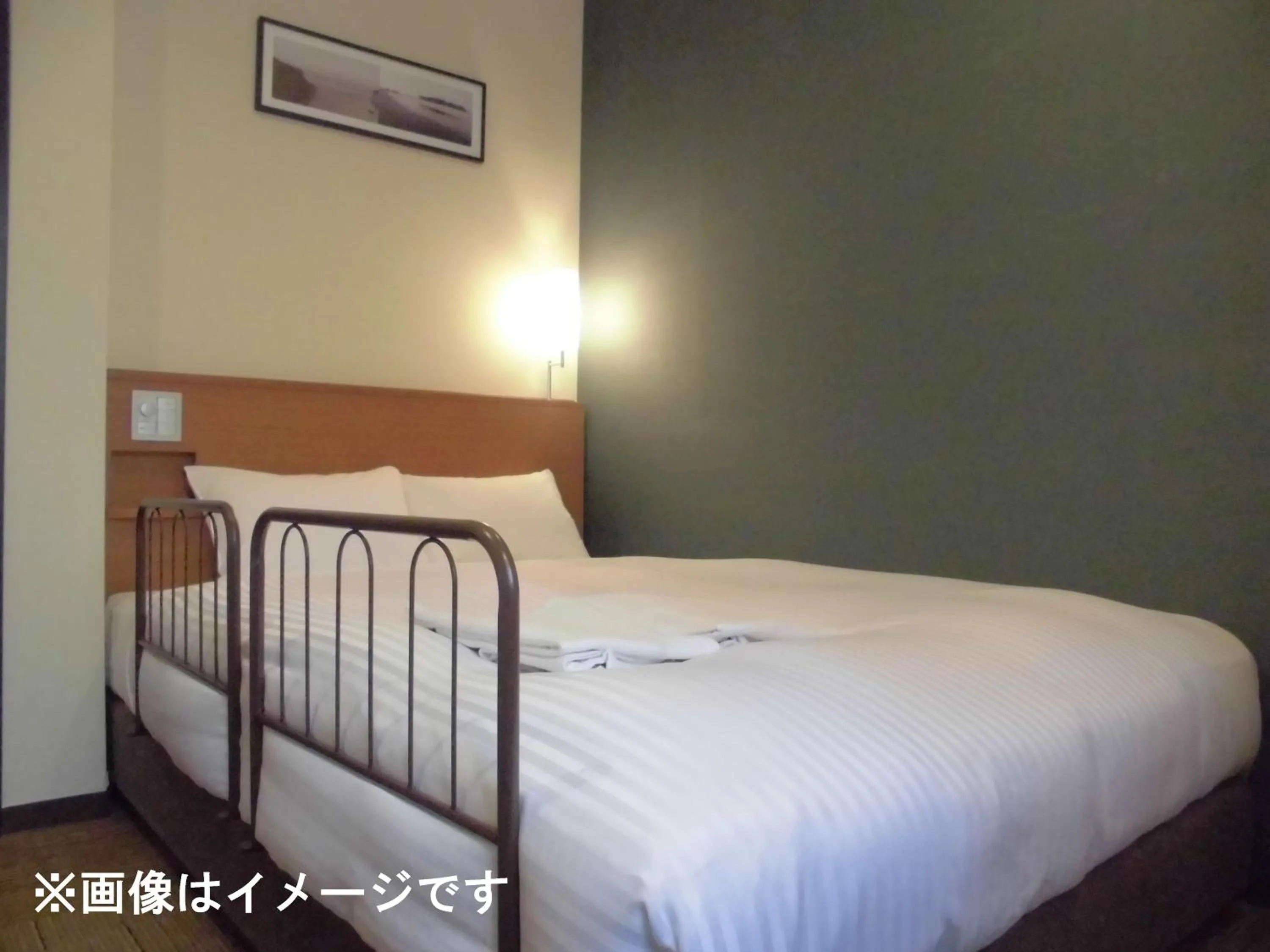 Bed in Sotetsu Fresa Inn Fujisawa-Minamiguchi