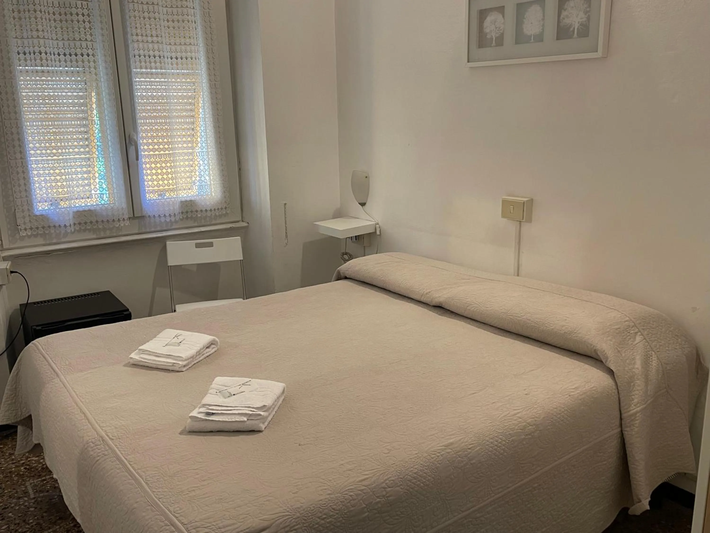 Bed in Albergo Novecento