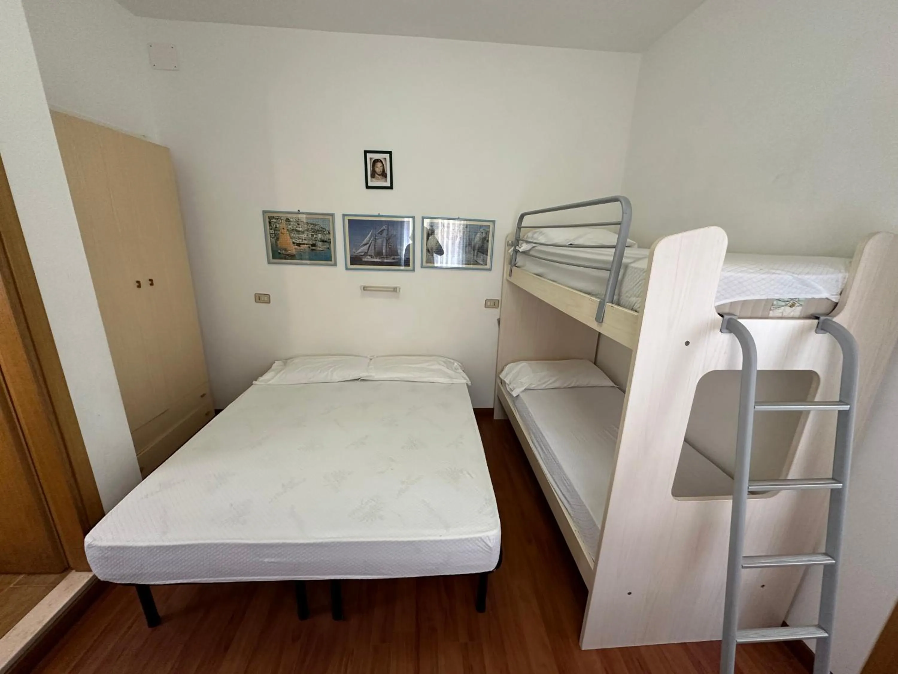 Photo of the whole room, Bed in Marconi Bilocale - Agenzia Cocal