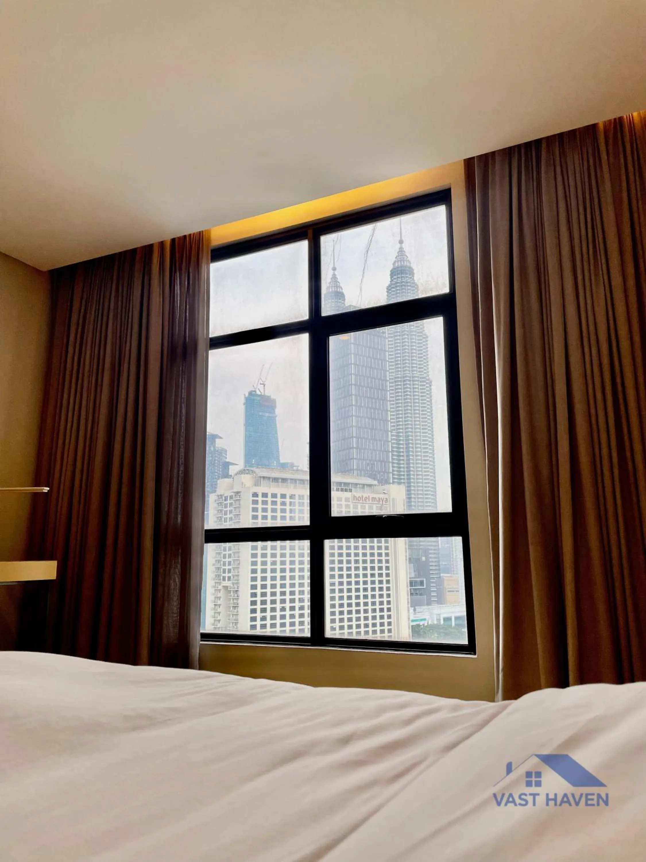 Bed in 188 Suites KLCC by VastHaven