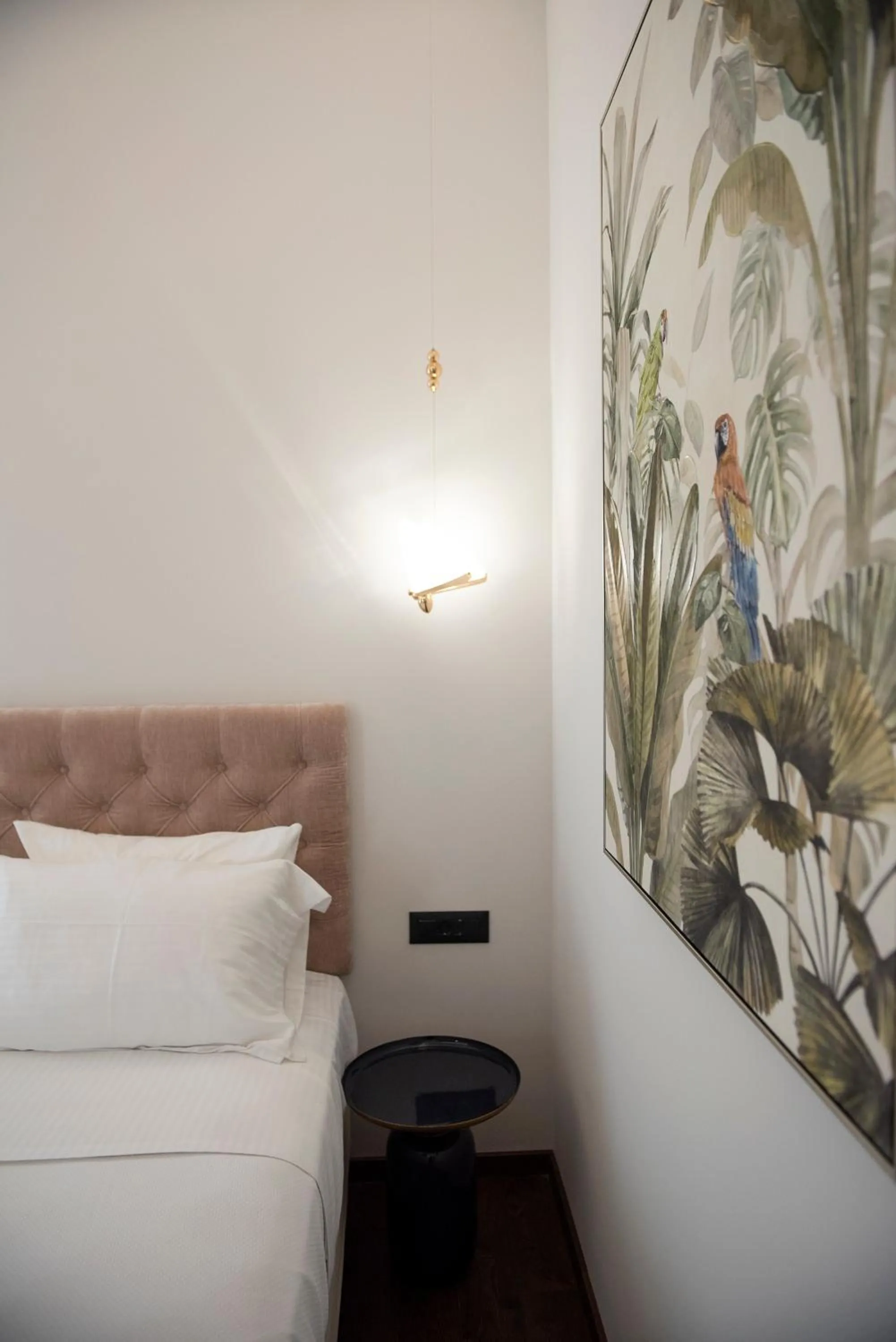 Bed in Jensen Luxury Suites