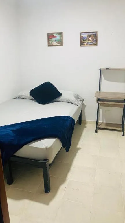 Bed in Hostal Cigarra