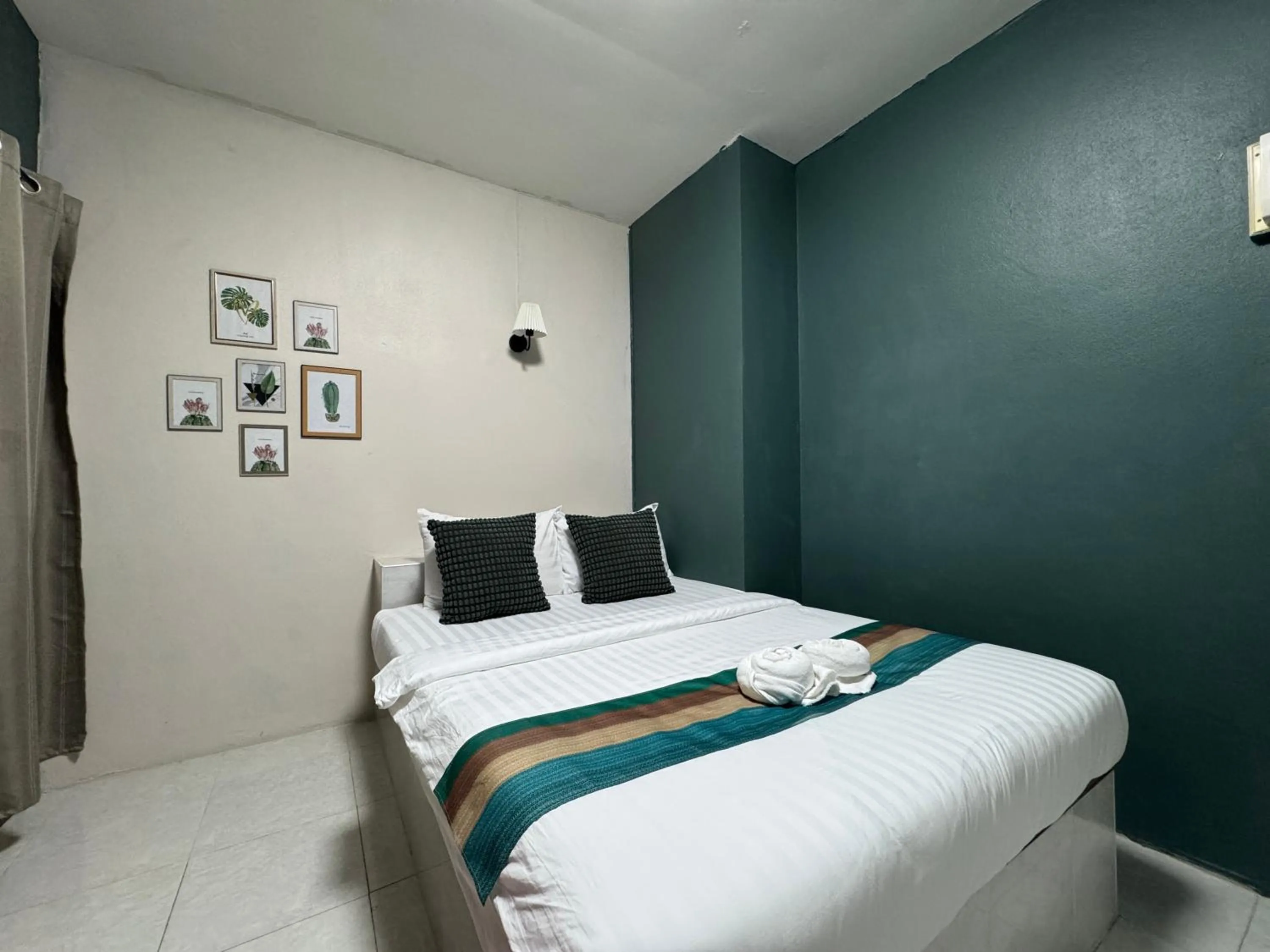 Bed in Paksina Hotel