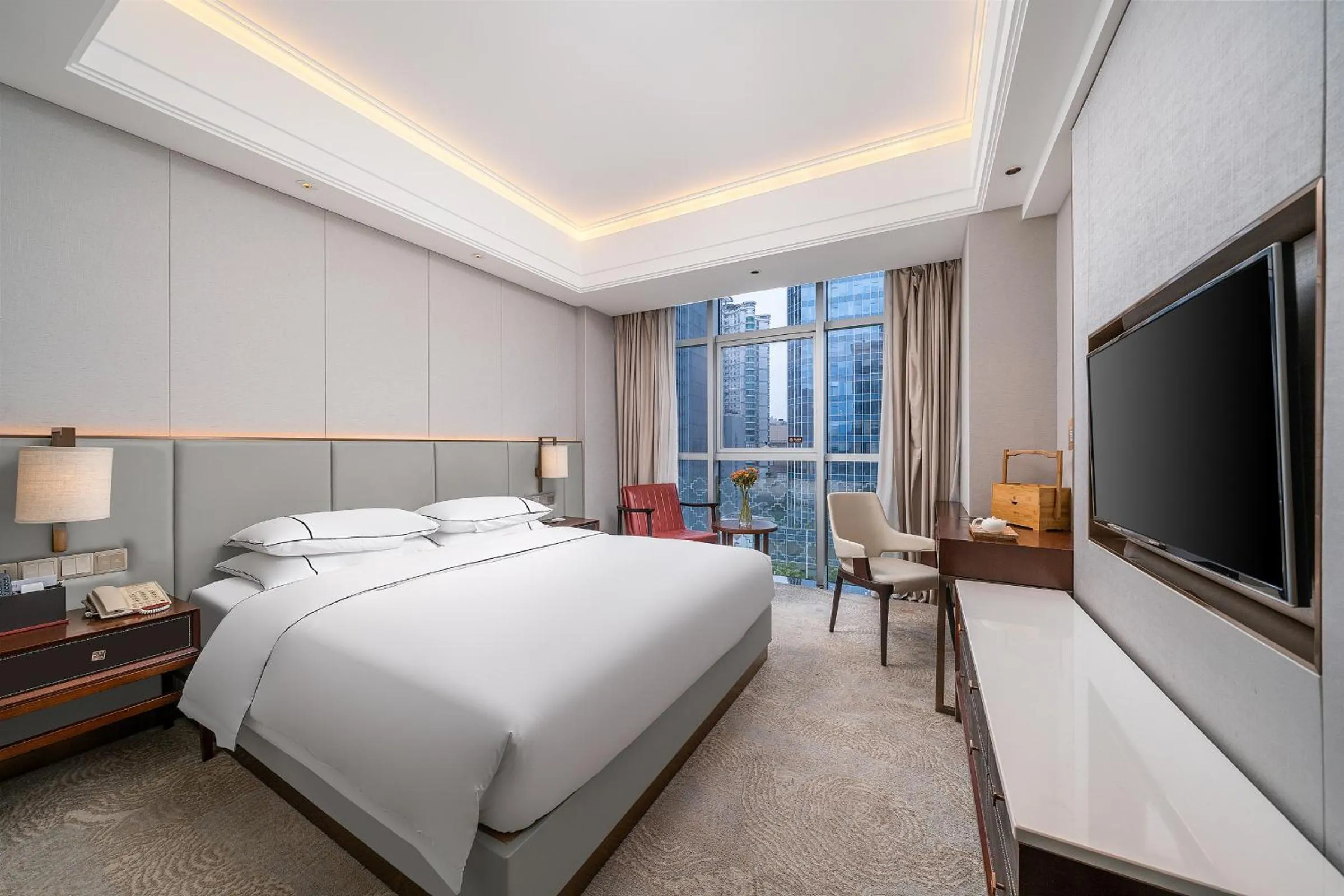 Communal lounge/ TV room, Bed in Echeng Hotel