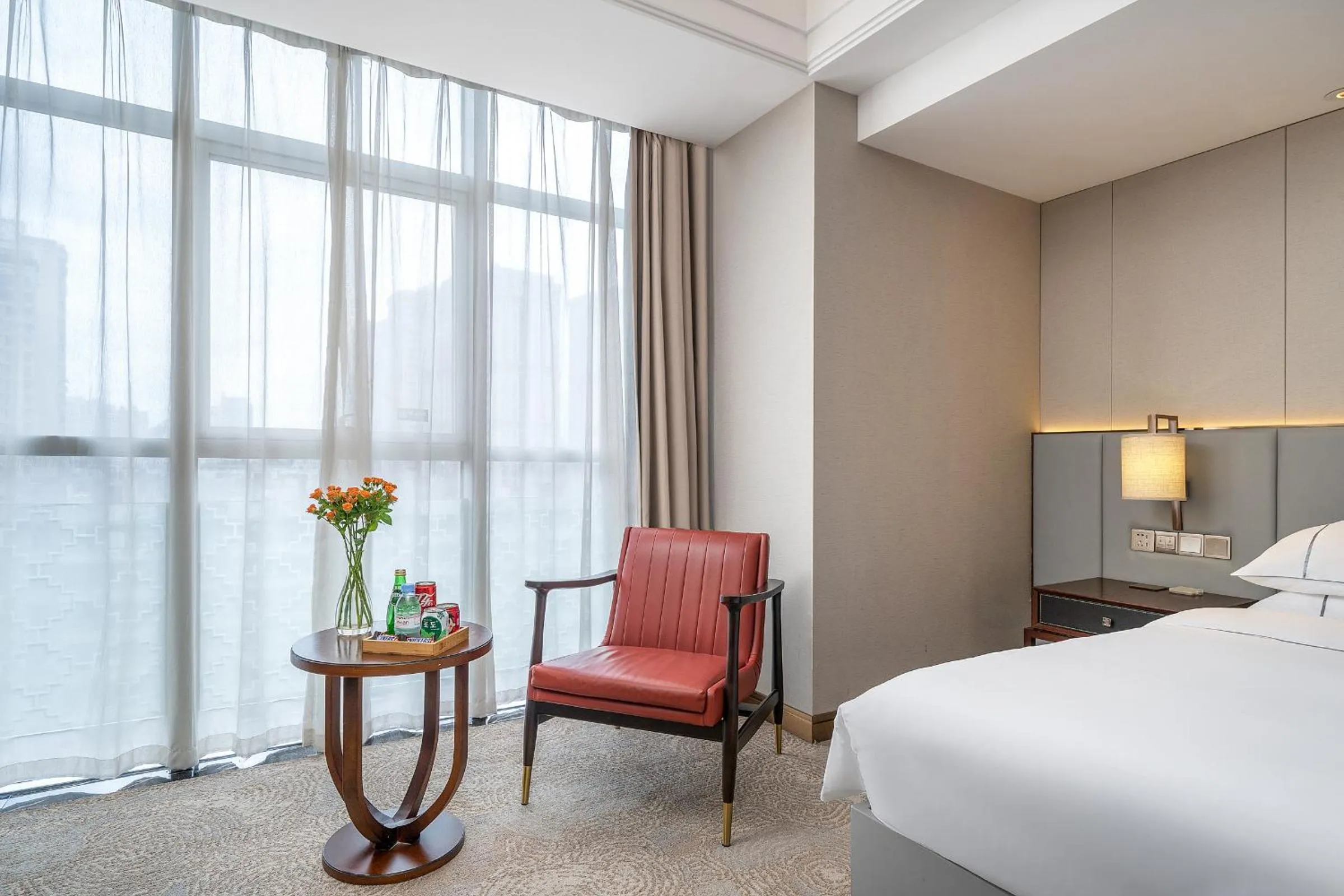 Seating area, Bed in Echeng Hotel