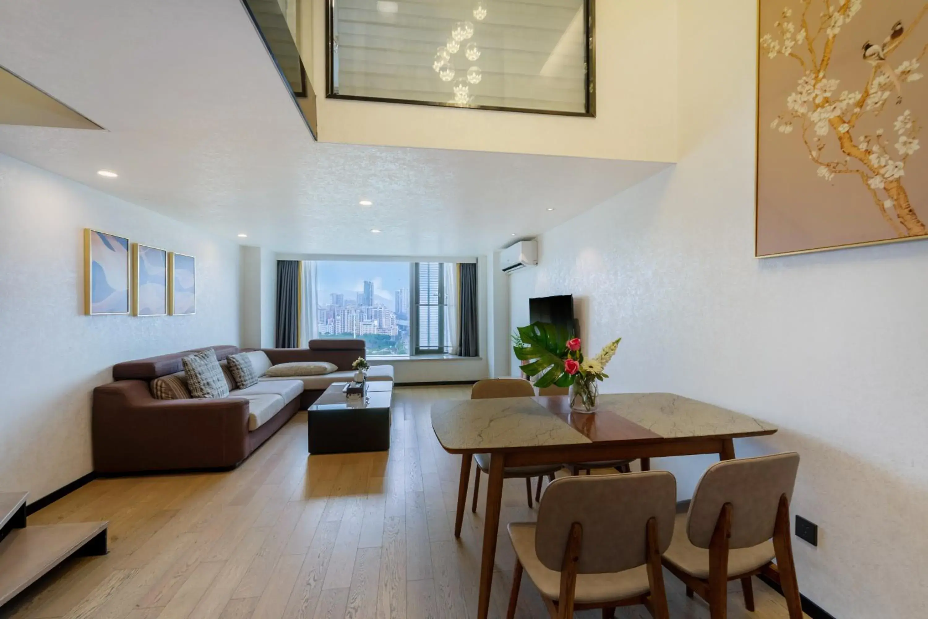 Living room in Xinghe Times Apartment - Shenzhen North Railway Station Living room in Xinghe Times Apartment - Shenzhen North Railway Station