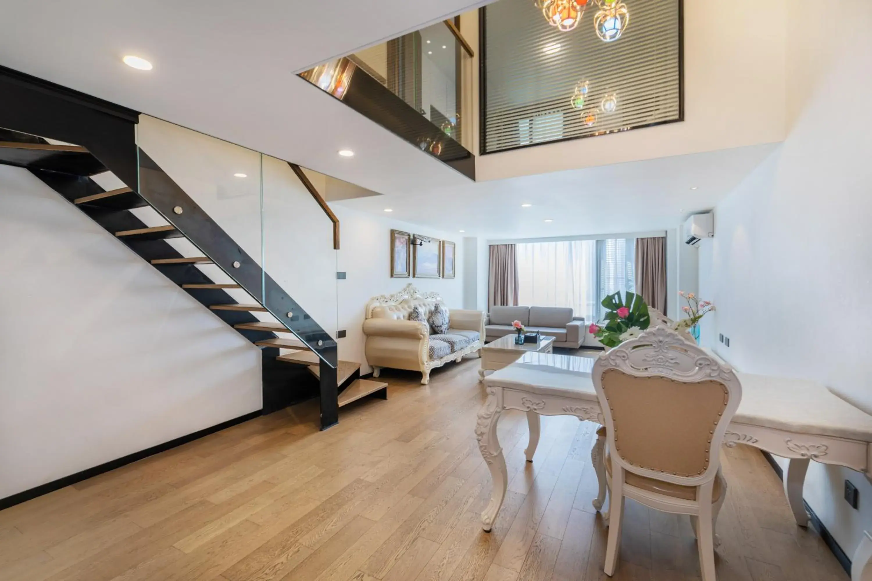 Living room in Xinghe Times Apartment - Shenzhen North Railway Station Living room in Xinghe Times Apartment - Shenzhen North Railway Station