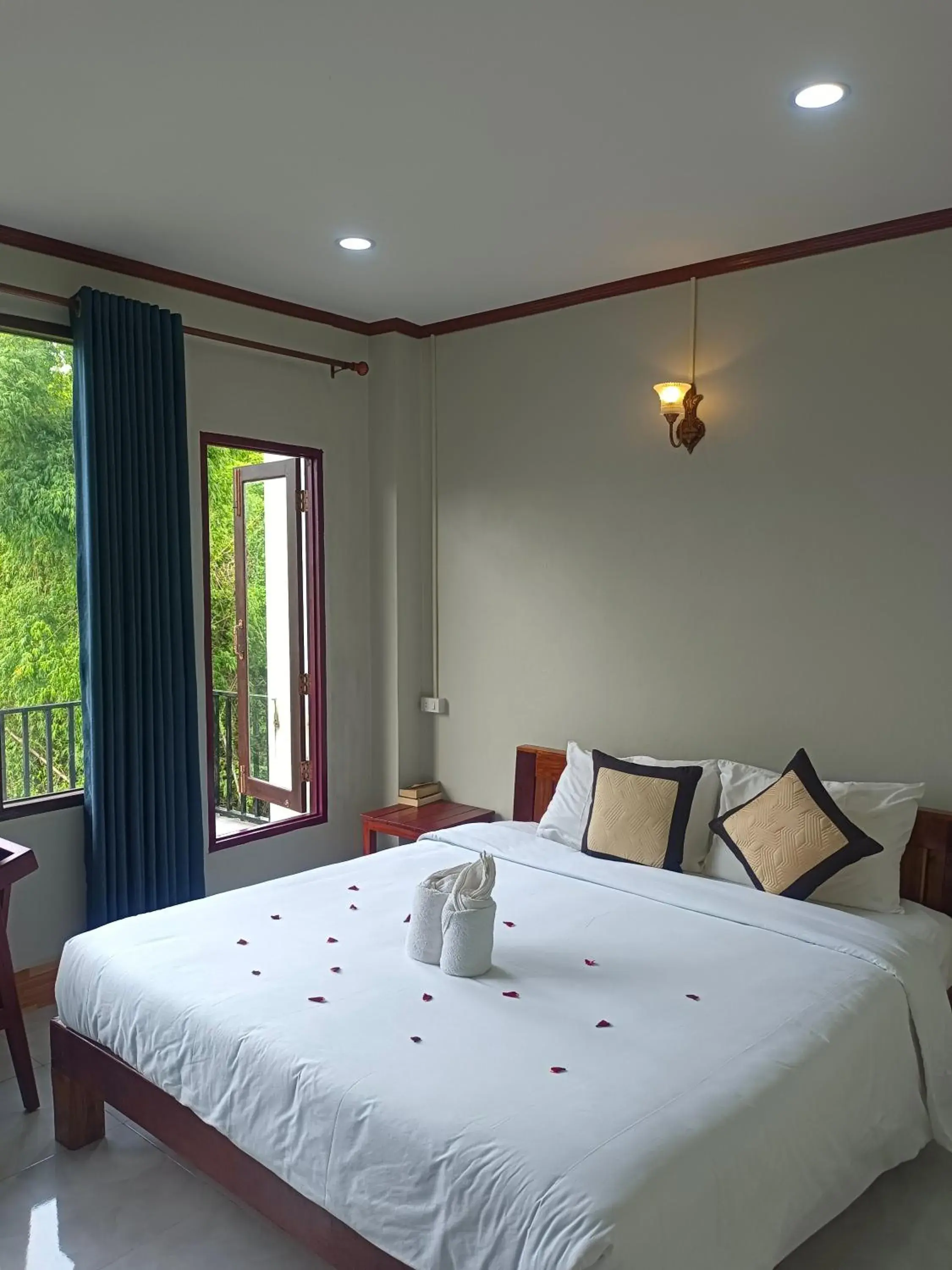 Bed in VangVieng Dokchampa Resort Bed in VangVieng Dokchampa Resort