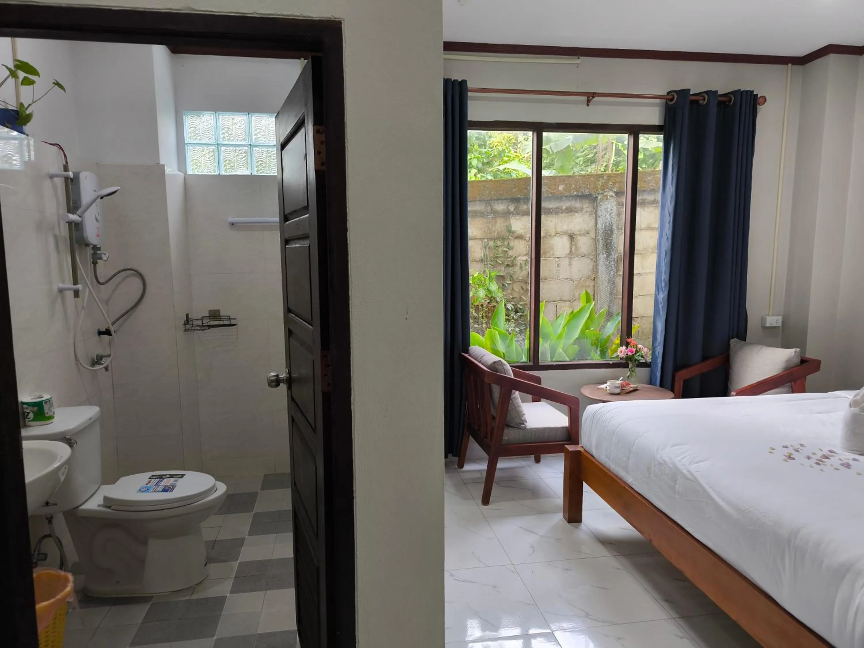 Bed in VangVieng Dokchampa Resort