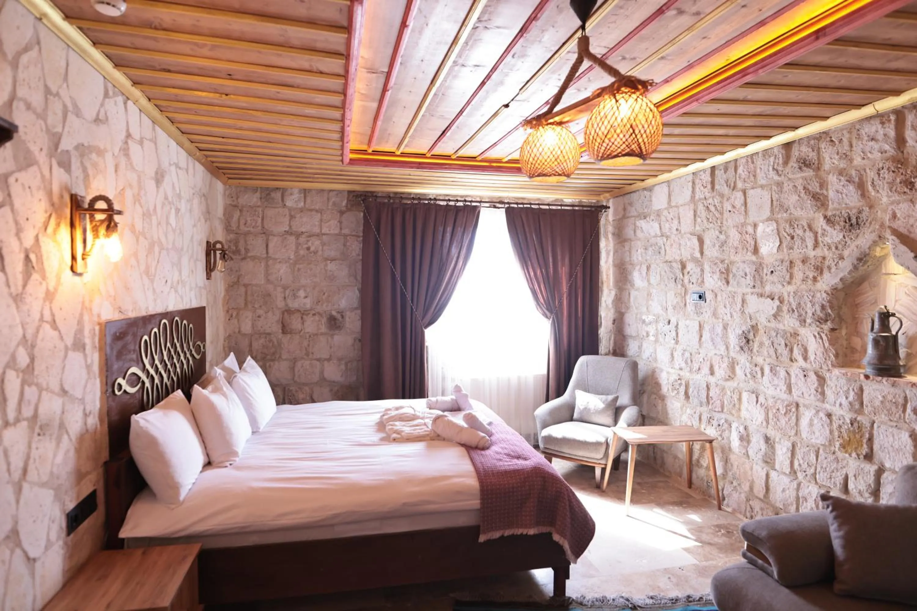 Bed in Stone Owl Otel & Restaurant