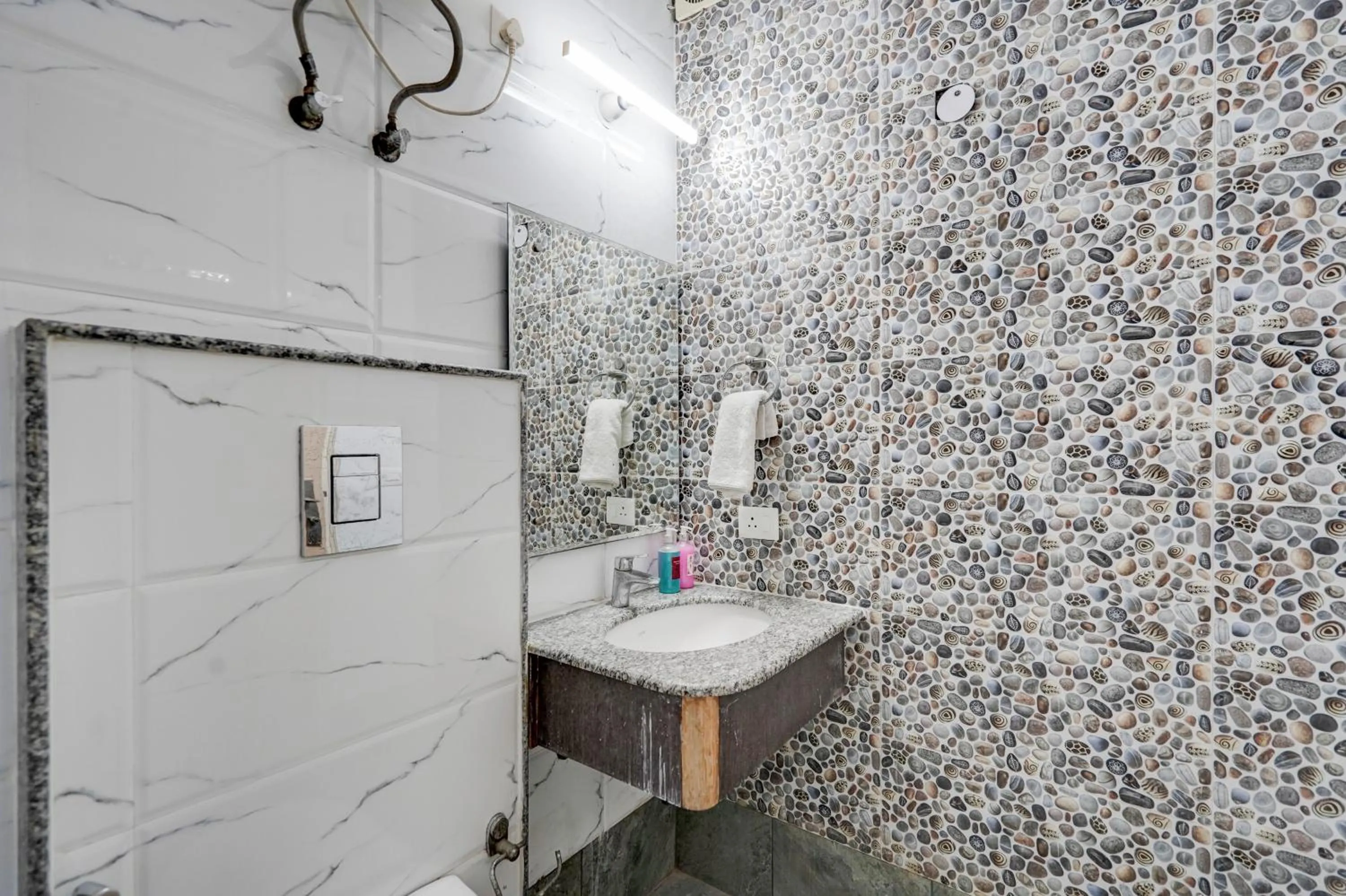 Bathroom in The Byke Express Medicity Near Medanta