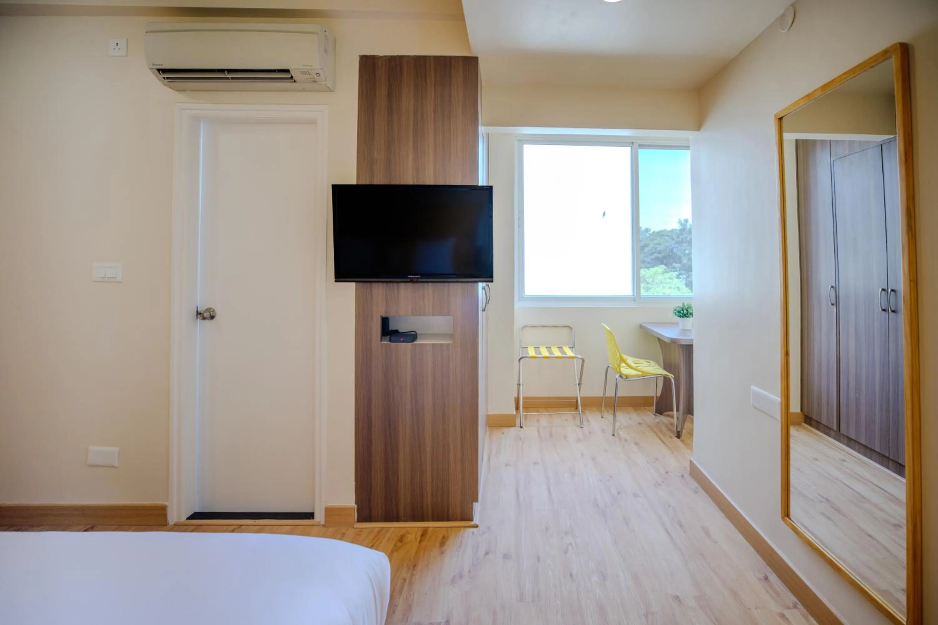 Bedroom, Bed in Bloom Hotel - HAL Old Airport Rd