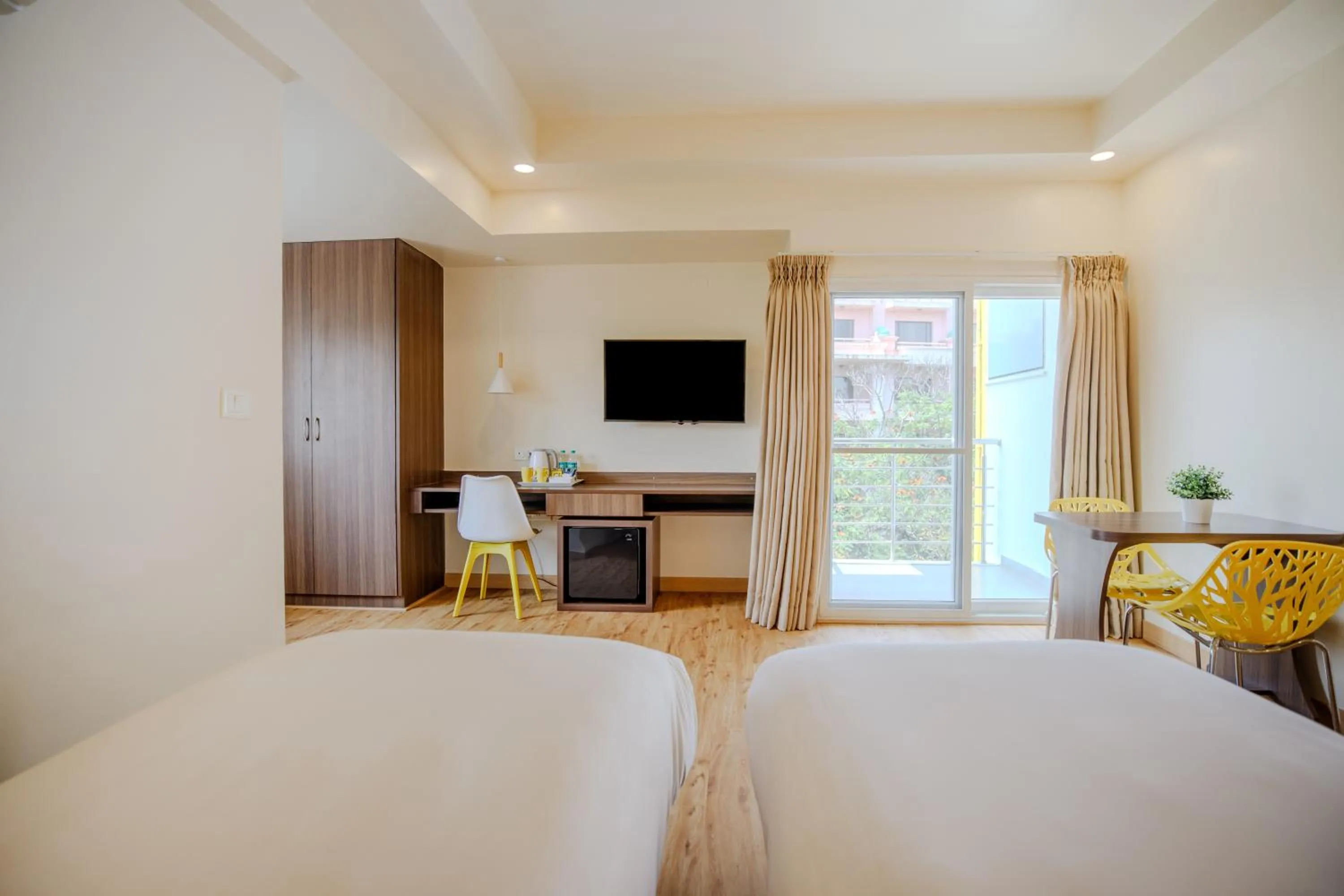 Bedroom, Bed in Bloom Hotel - HAL Old Airport Rd