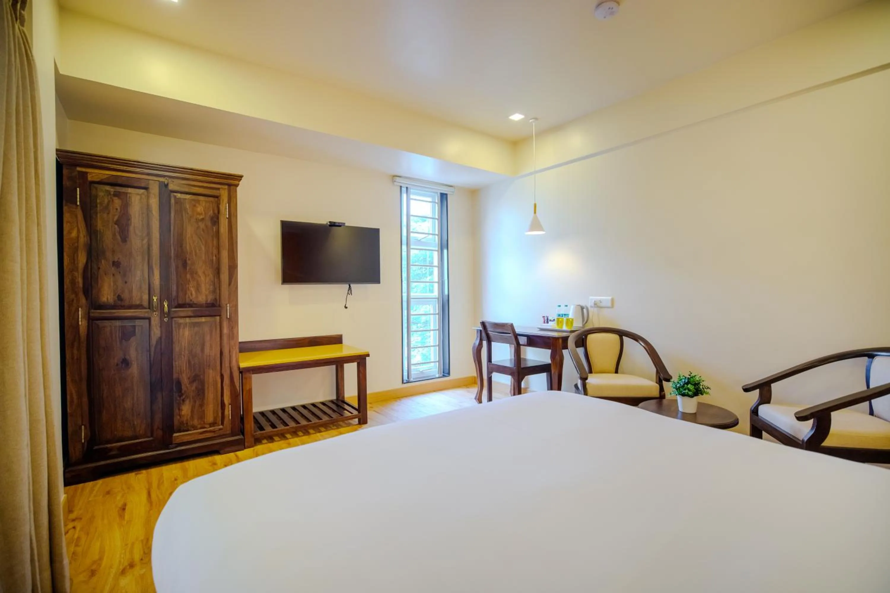 Bedroom, Bed in Bloom Hotel - HAL Old Airport Rd