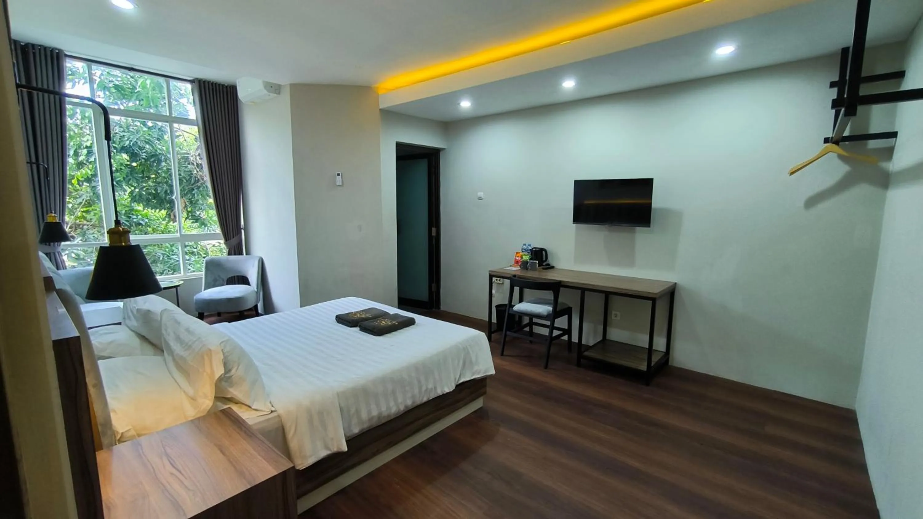 Bed in Royal Kencana Hotel powered by Cocotel