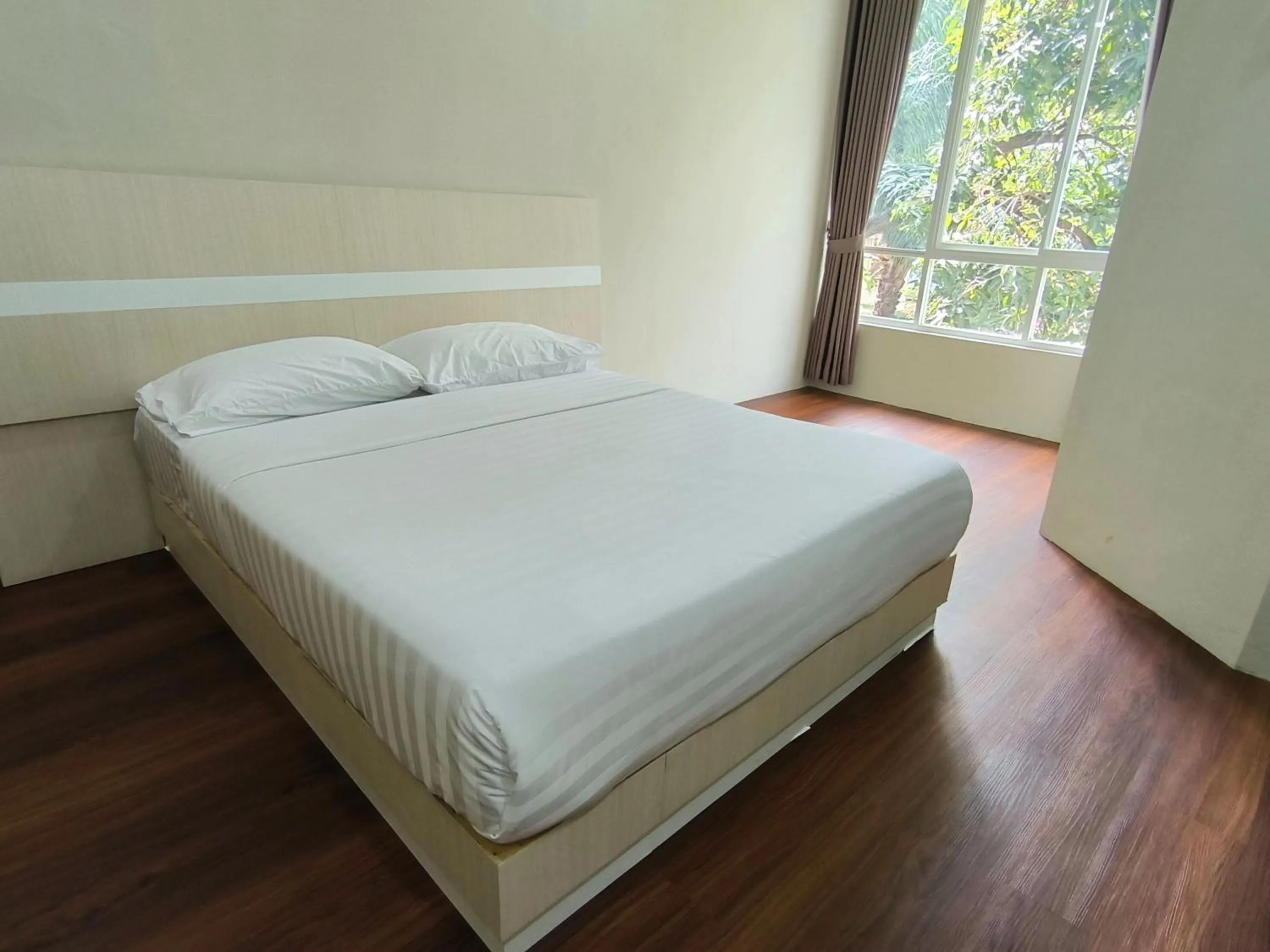 Bed in Royal Kencana Hotel powered by Cocotel