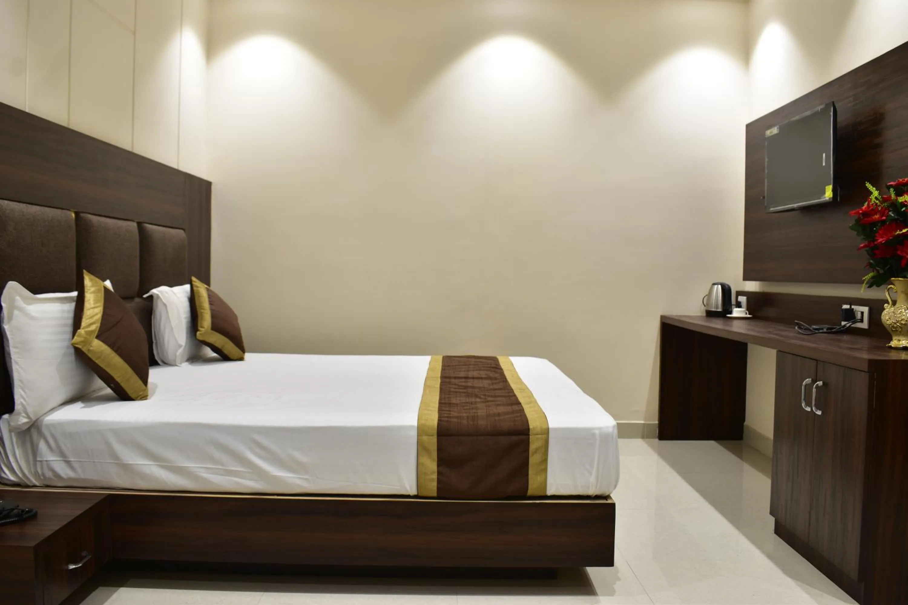 Bed in Hotel Kusum Palace