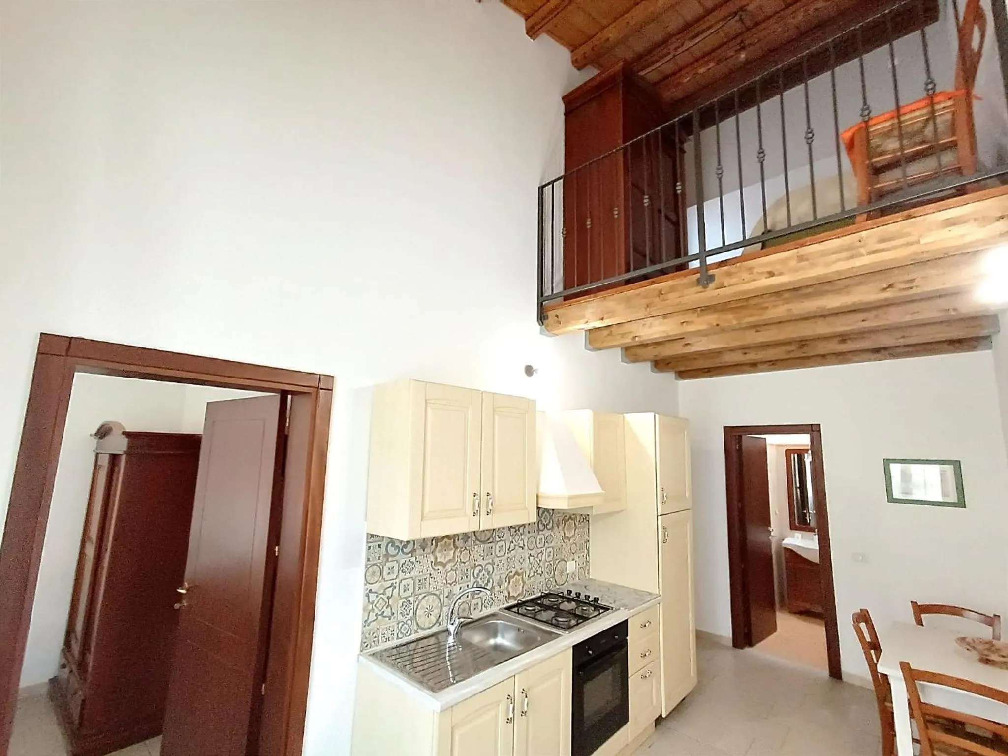 Kitchen or kitchenette in Morfeo Charming Rooms & Relax