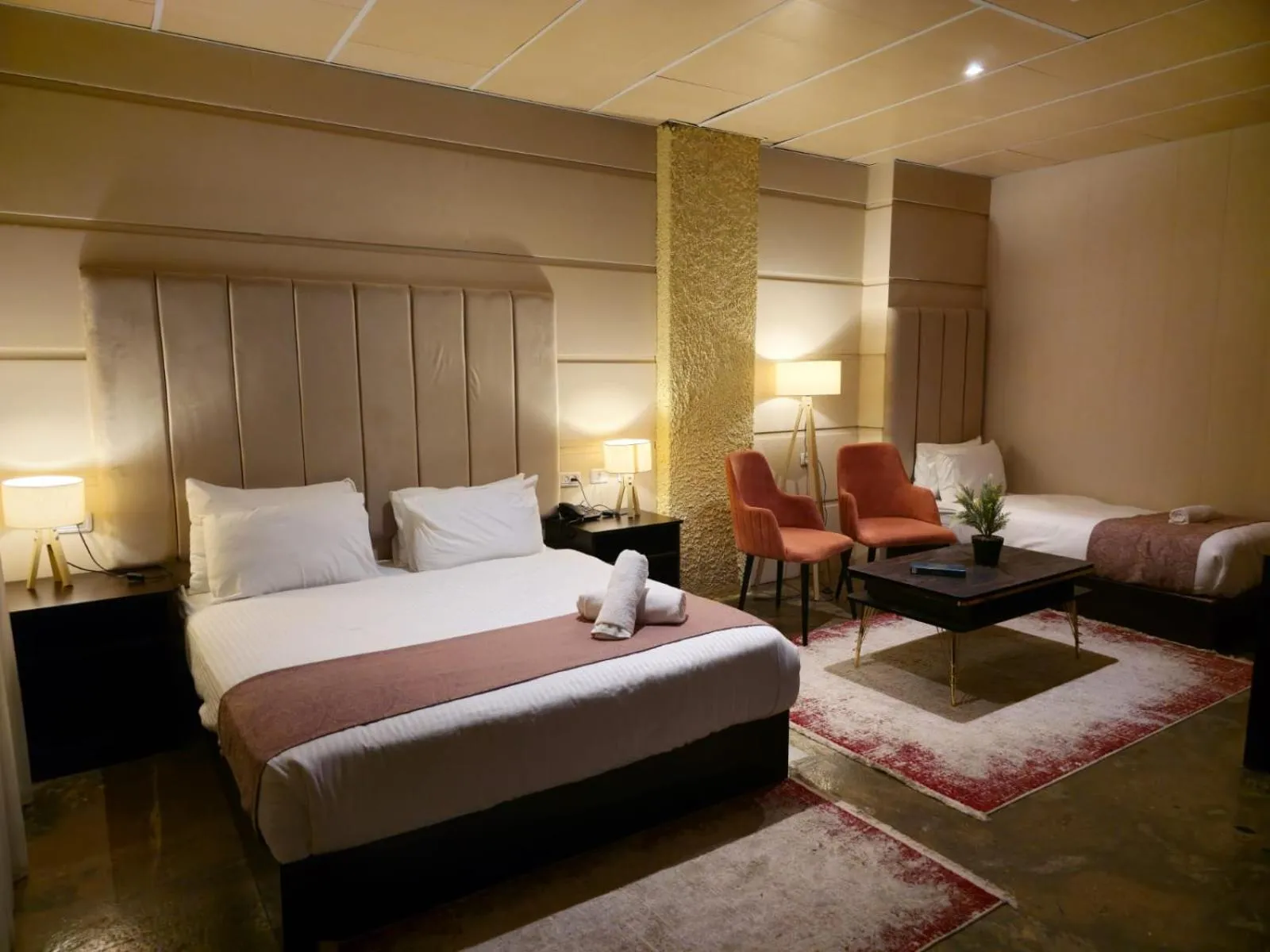 Bed in Qasr alnkheel resort and hotel