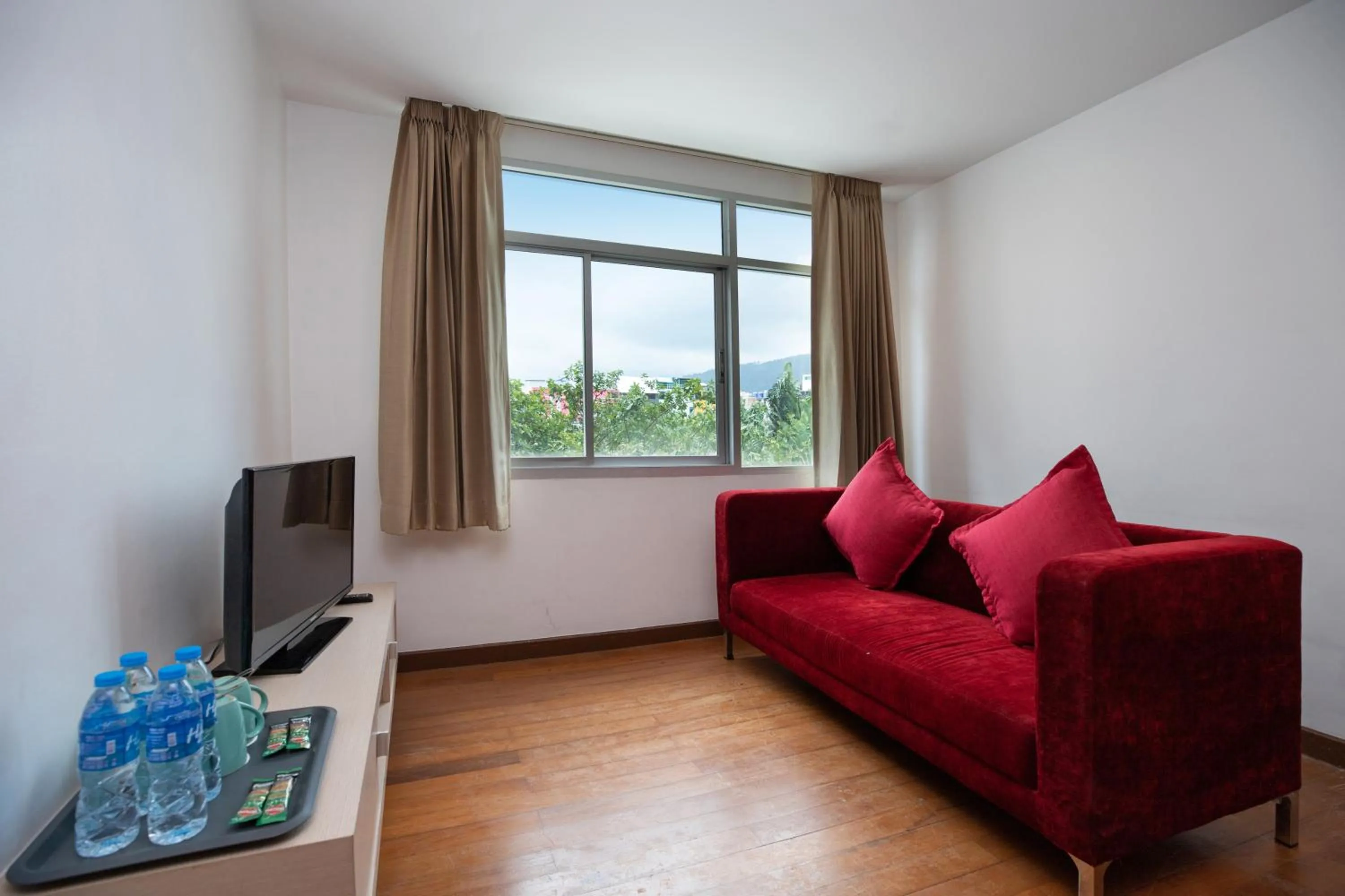 Communal lounge/ TV room in iCheck inn Residences Patong