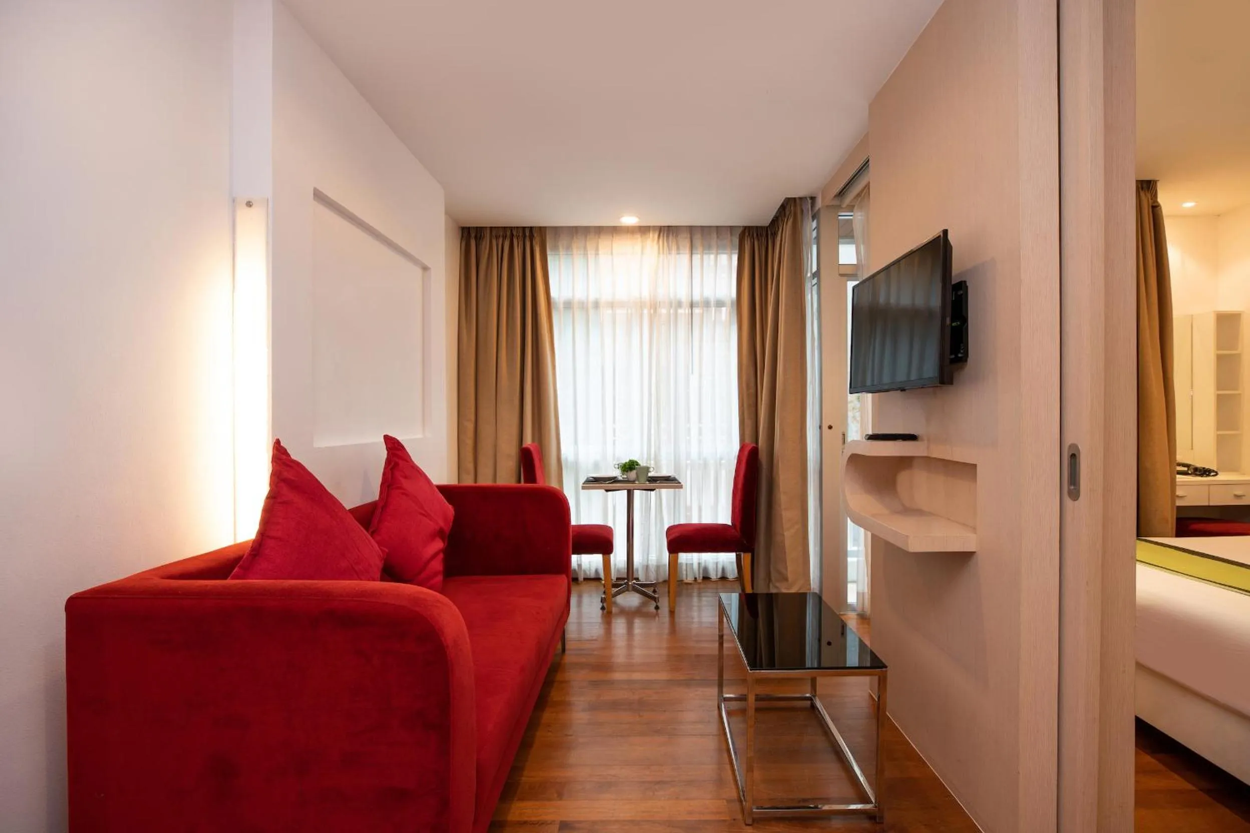 Communal lounge/ TV room in iCheck inn Residences Patong