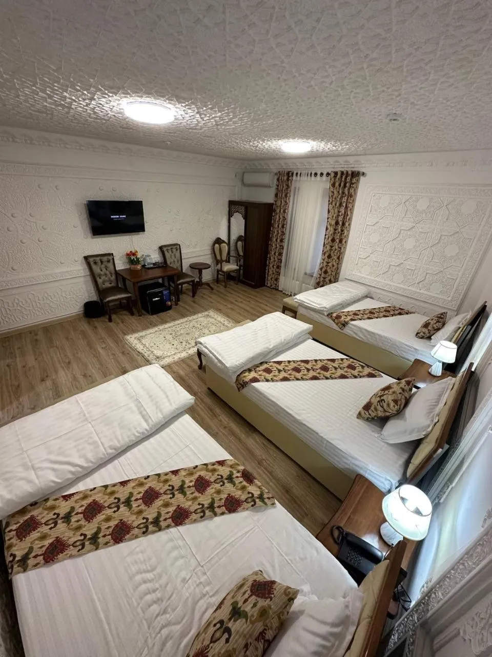 Photo of the whole room, Bed in AMIRAN Boutique