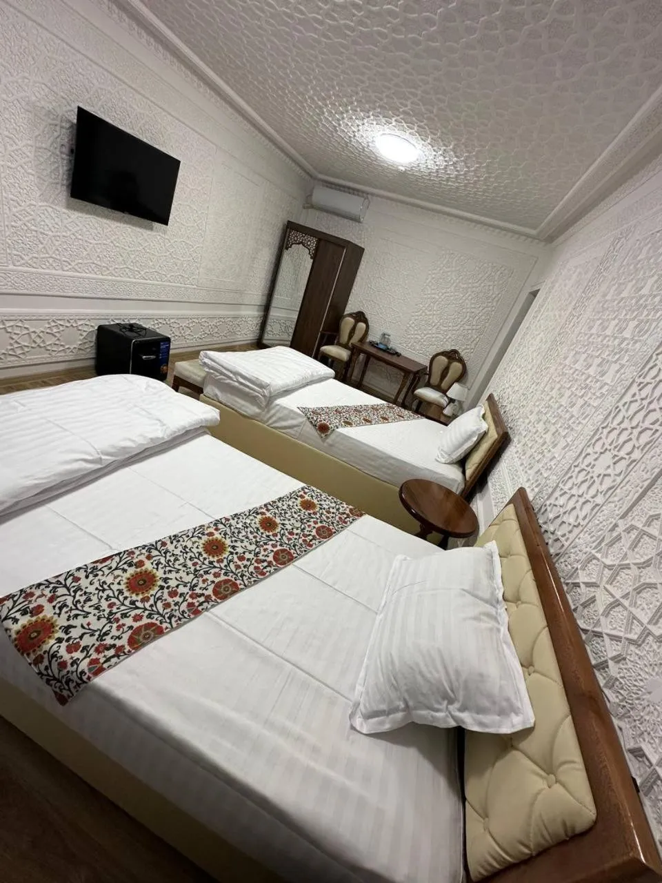 Photo of the whole room, Bed in AMIRAN Boutique