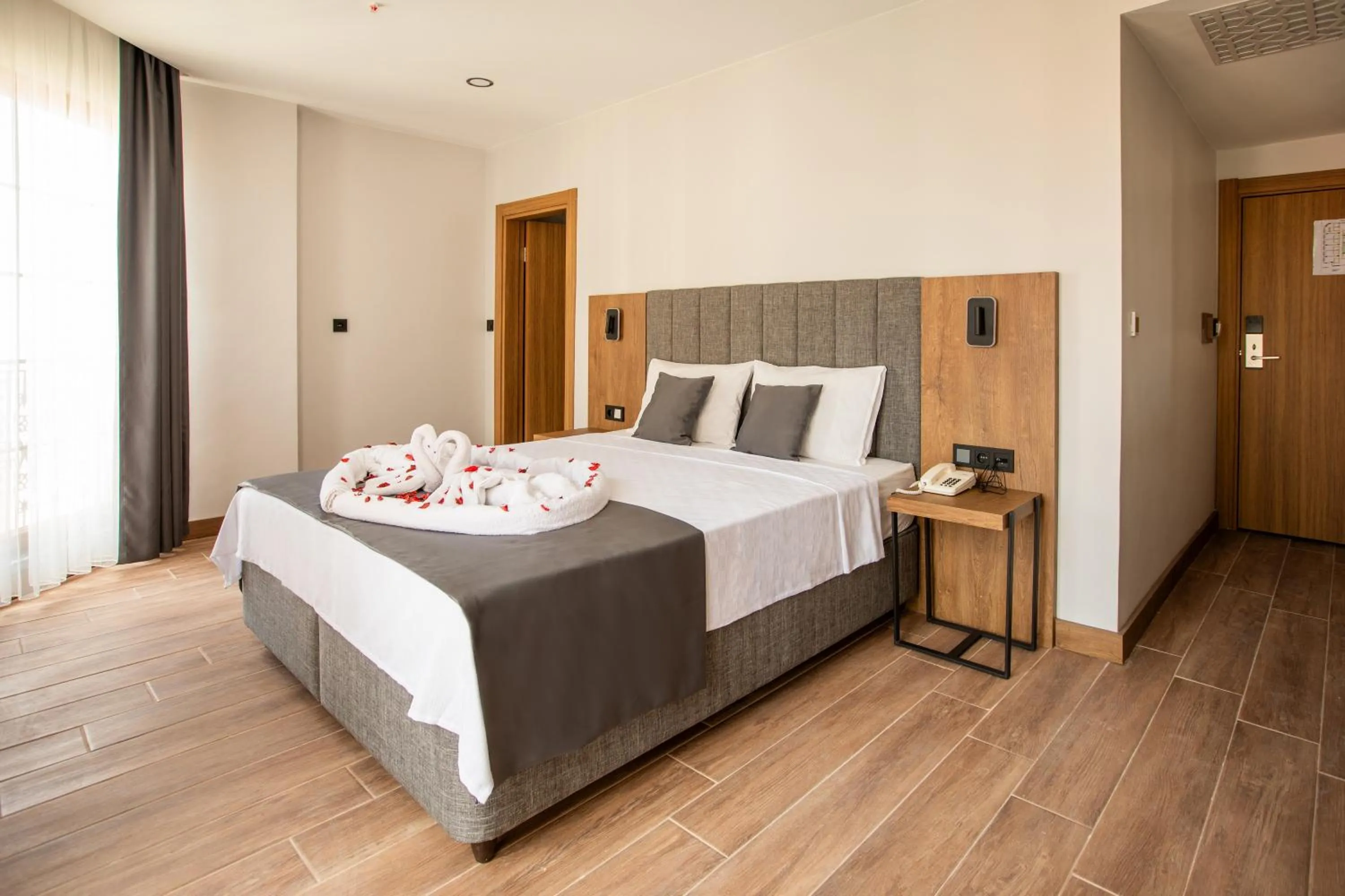 Photo of the whole room, Bed in Grand Business Hotel