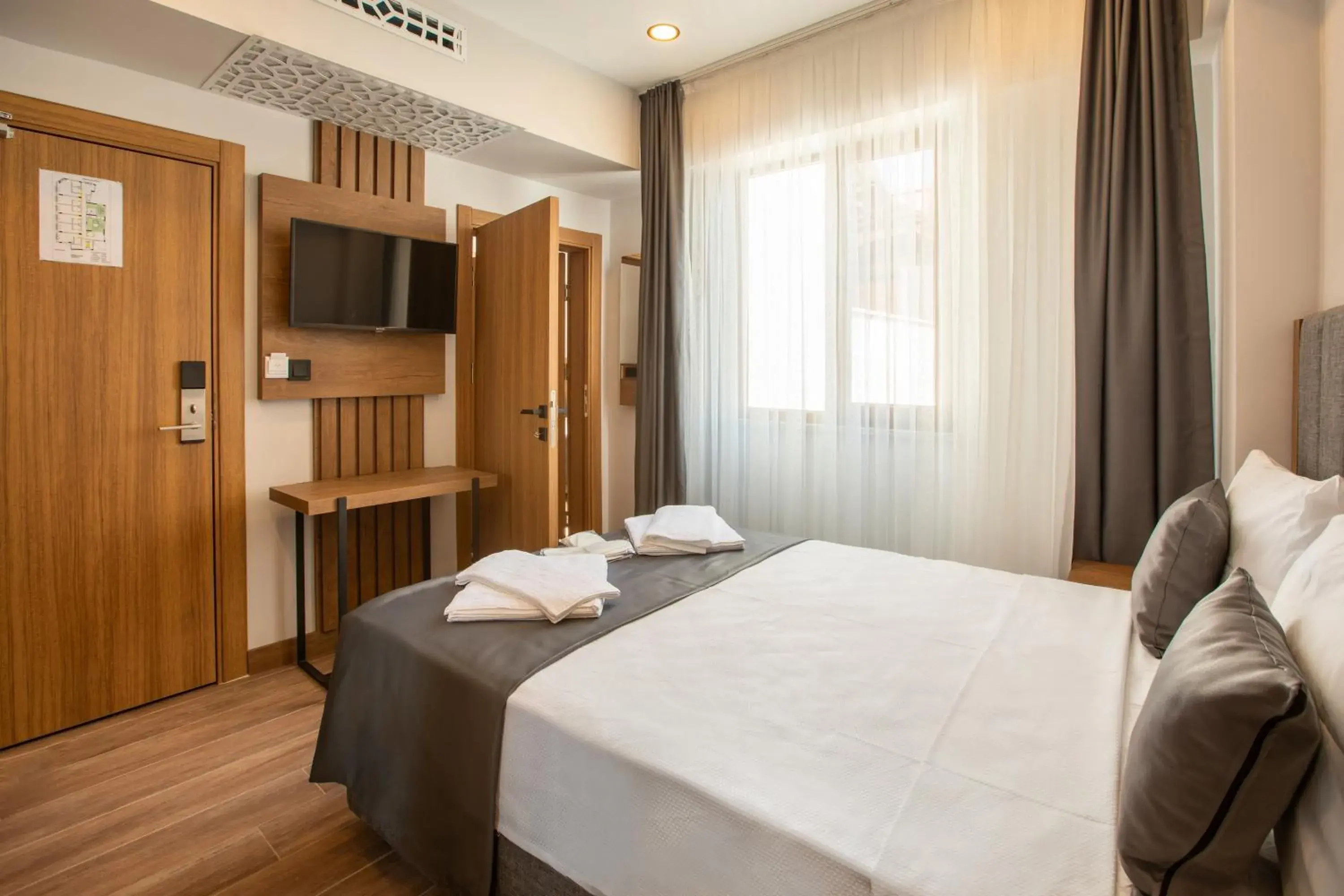 Bed in Grand Business Hotel Bed in Grand Business Hotel