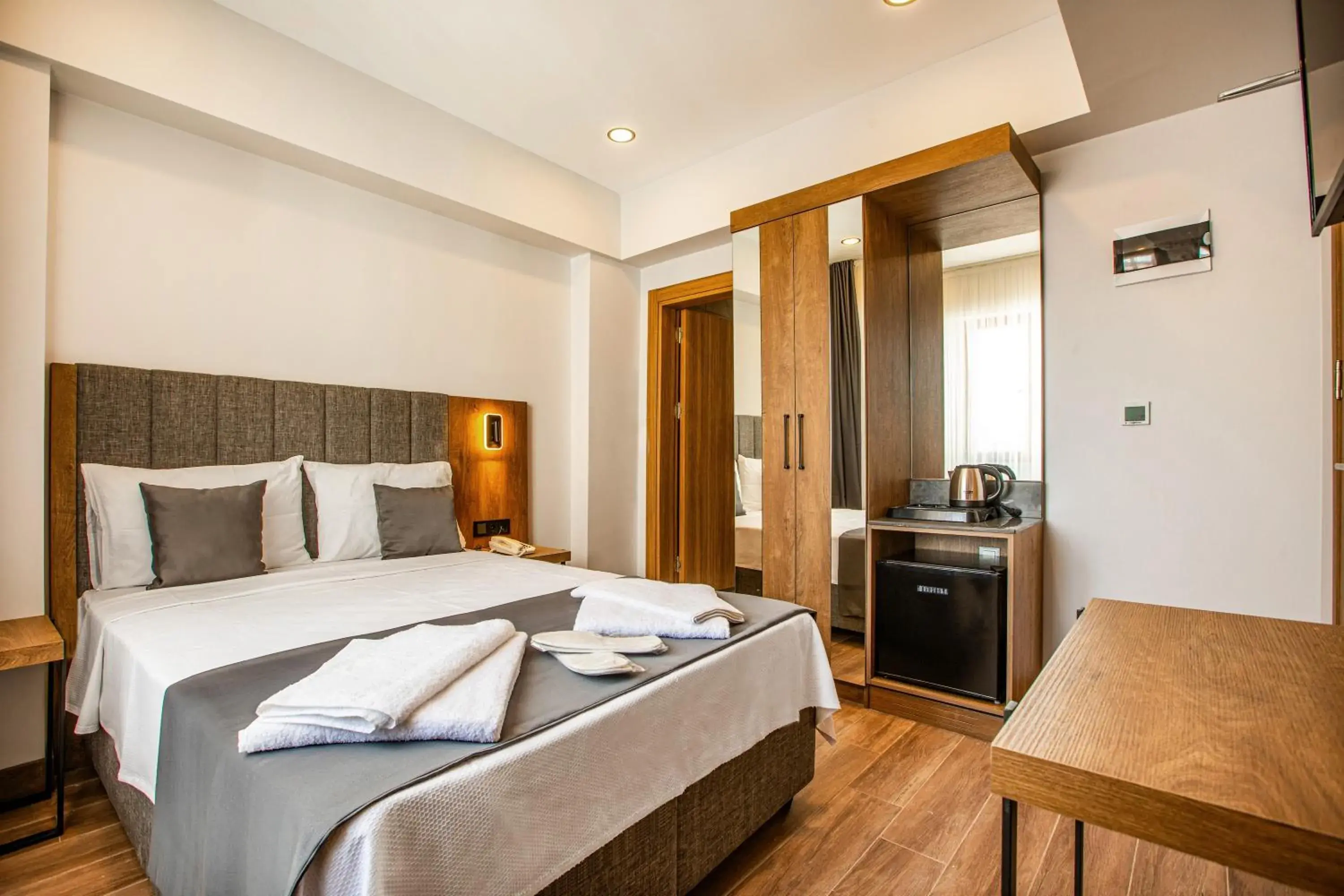 Bed in Grand Business Hotel Bed in Grand Business Hotel