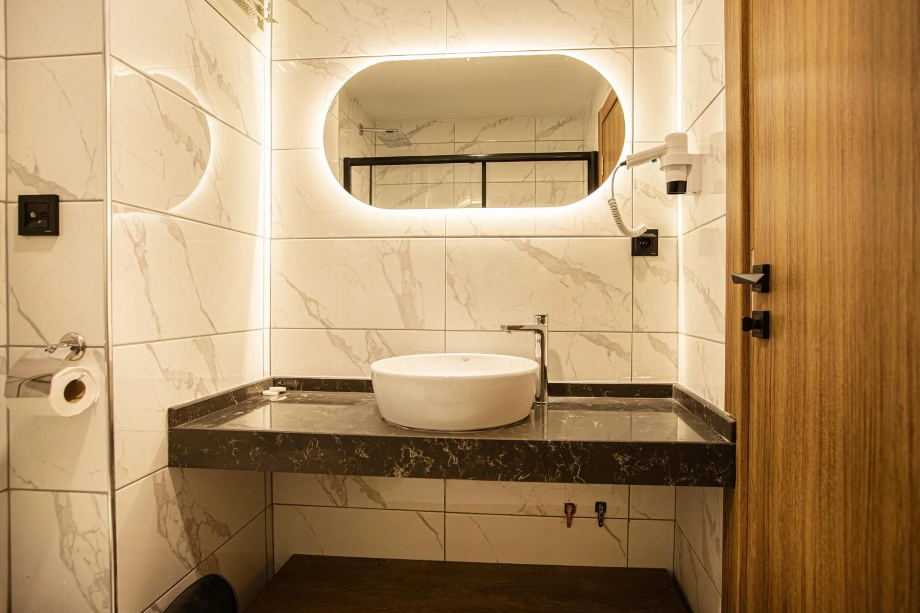 Shower in Grand Business Hotel