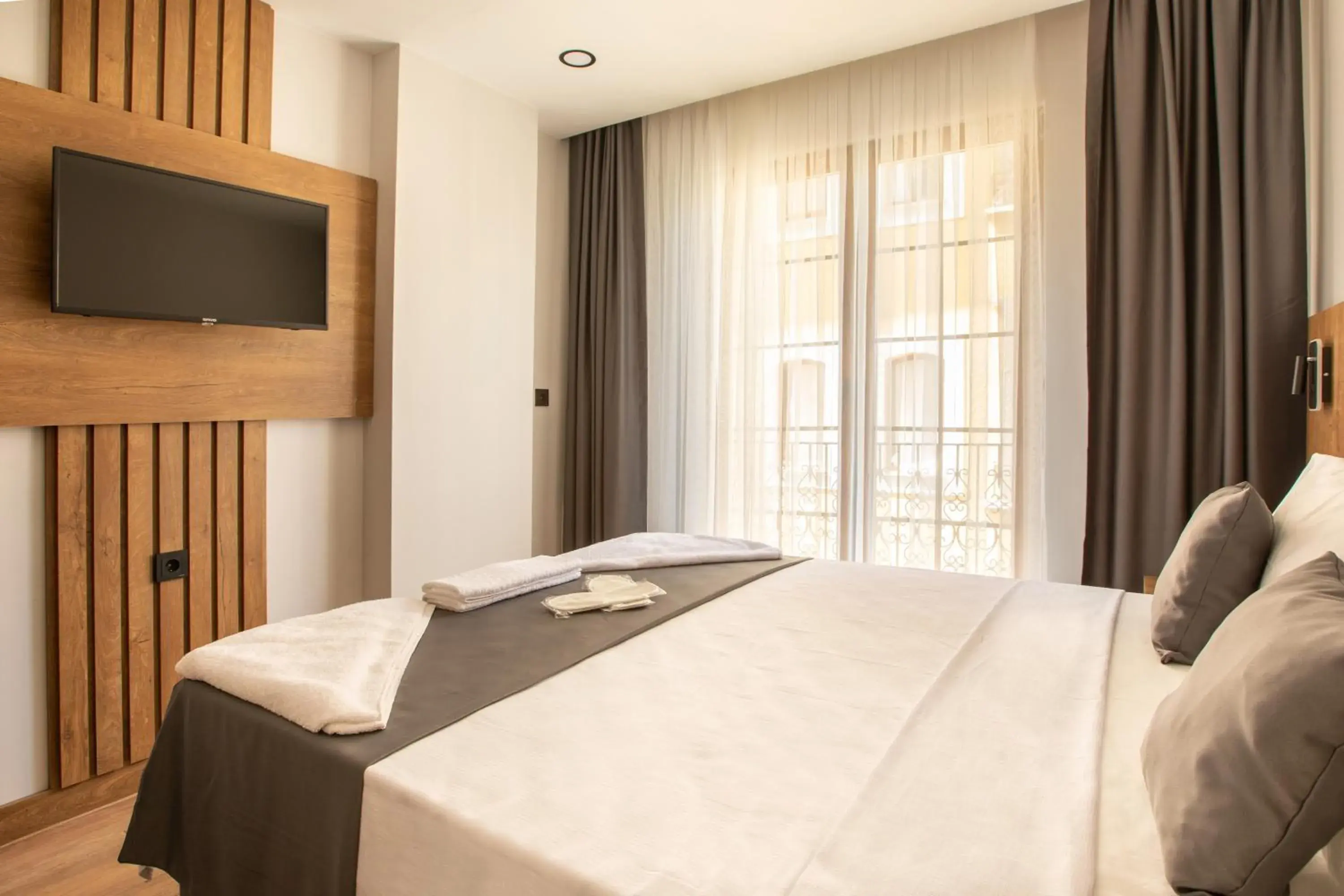 TV and multimedia, Bed in Grand Business Hotel TV and multimedia, Bed in Grand Business Hotel