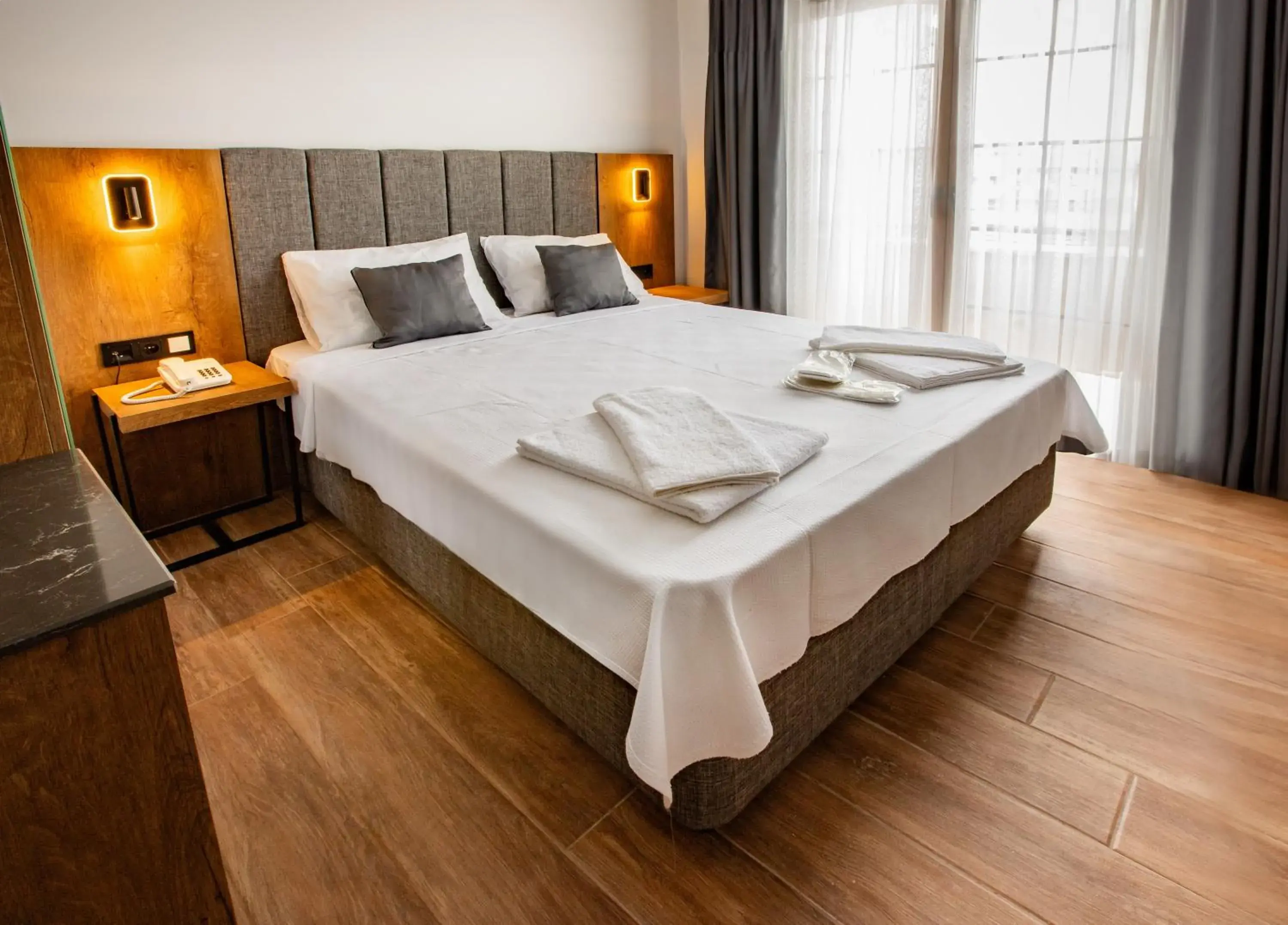 Bed in Grand Business Hotel Bed in Grand Business Hotel