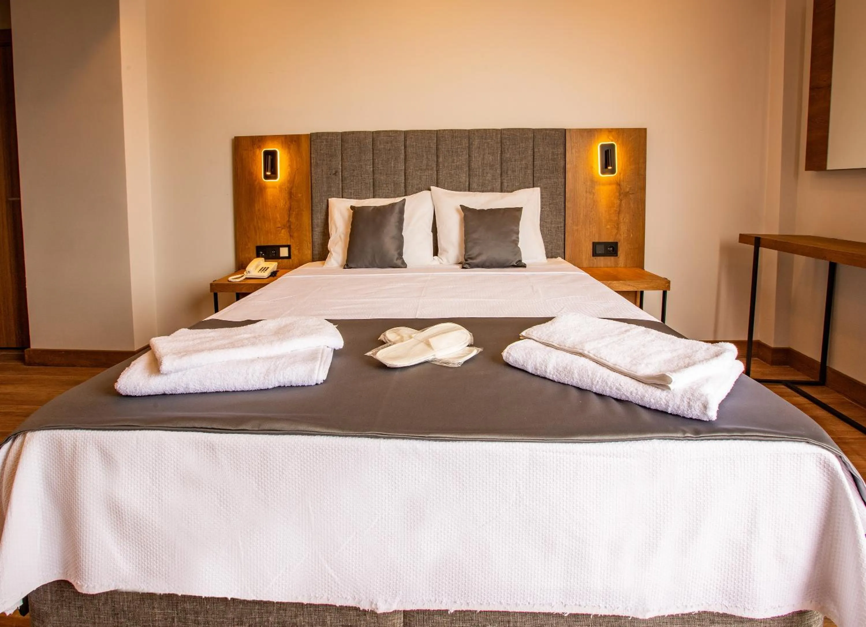 Bed in Grand Business Hotel