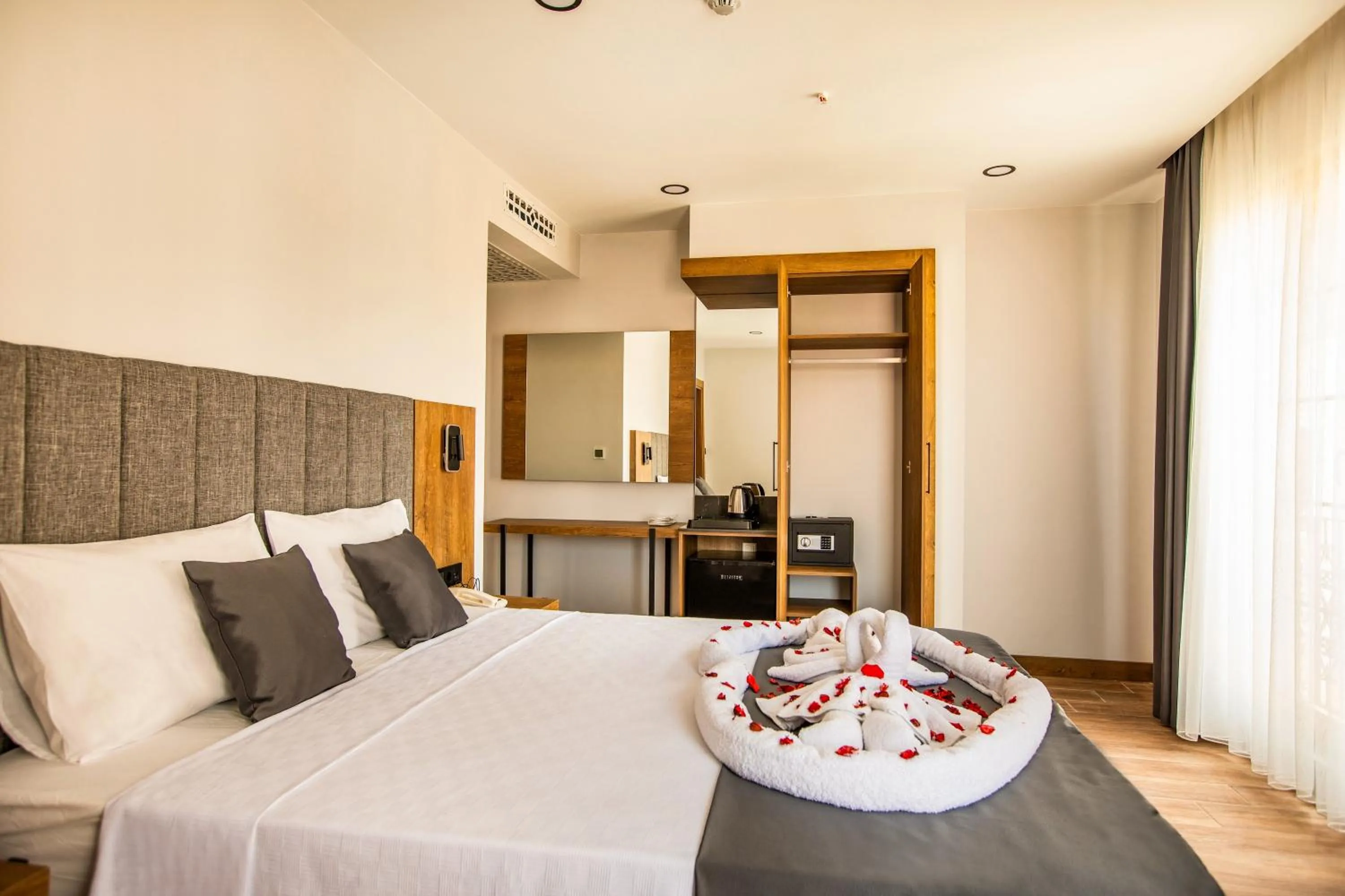 Bed in Grand Business Hotel