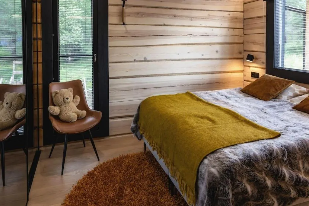 Bed in Upea Villa Lapin Kulta hirsihuvila Inarijärven rannalla