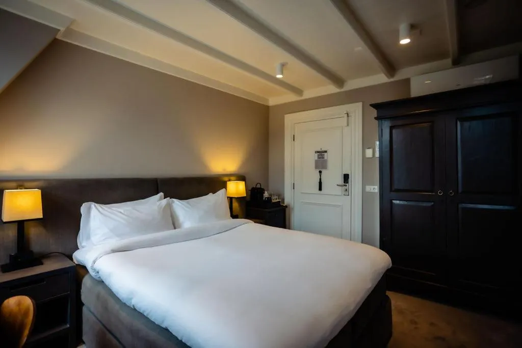 Bed in Villa de Duinen - Adults Only