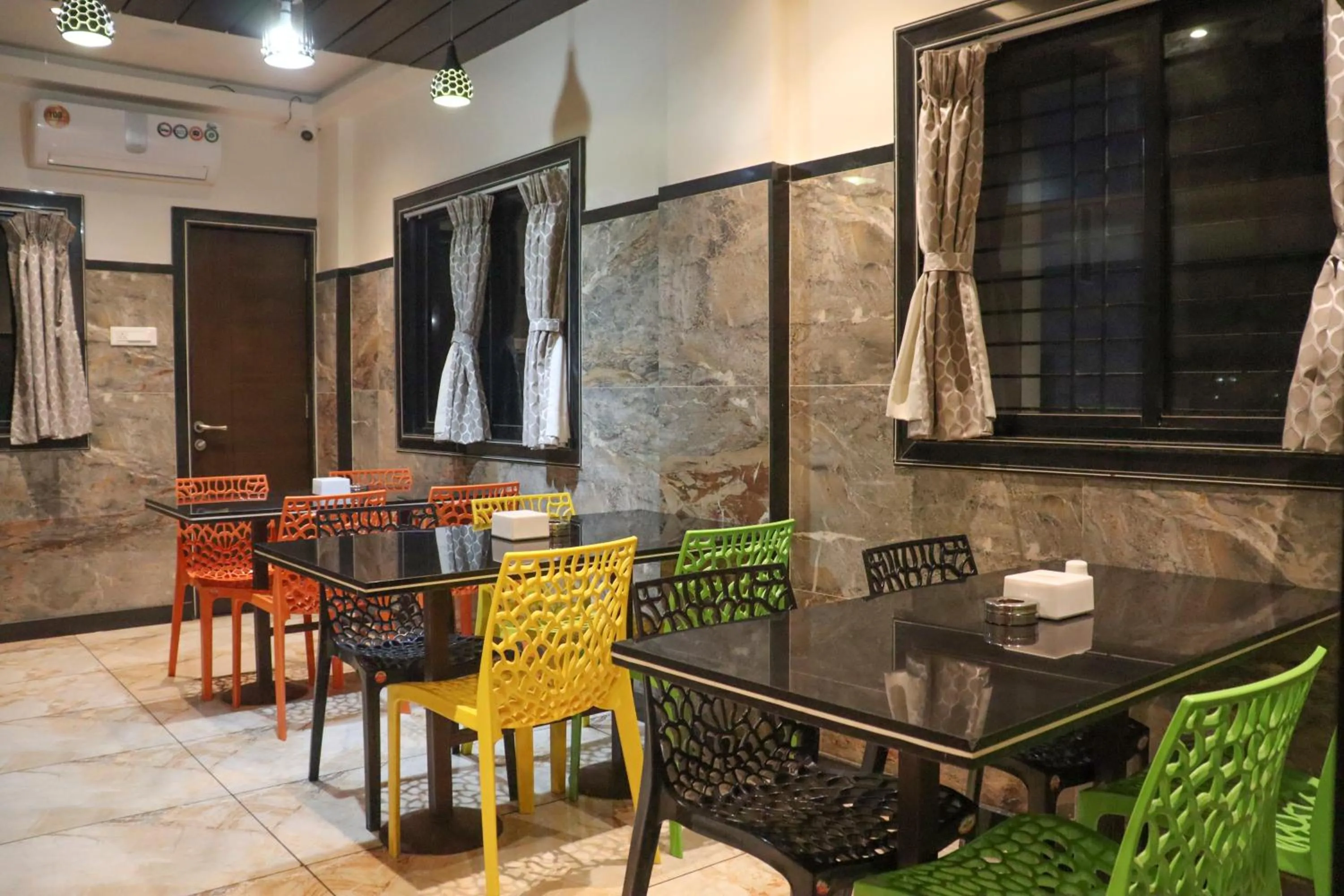 Dining area in Hotel Garuda Executive Latur