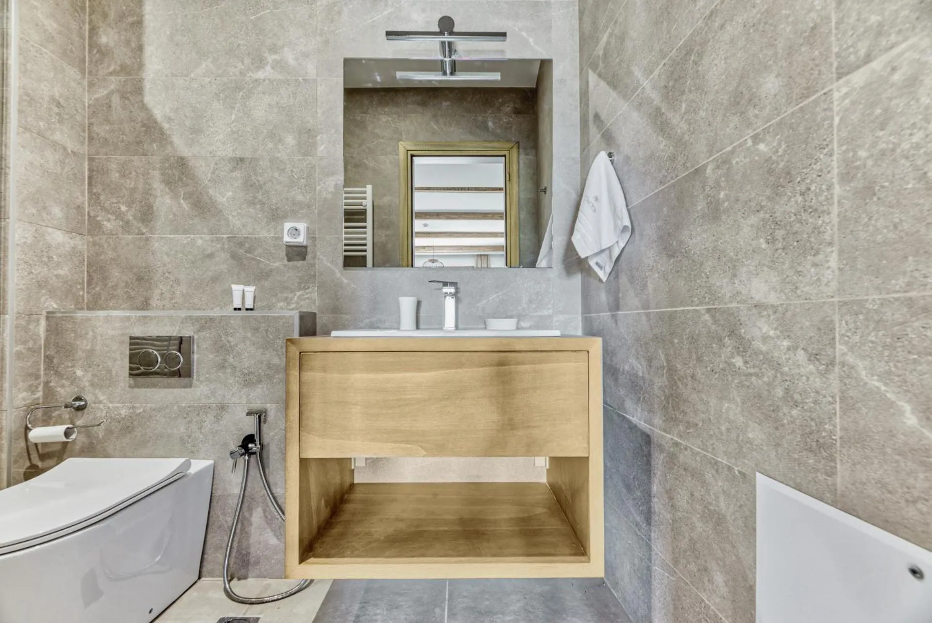 Bathroom in Komody Apartments