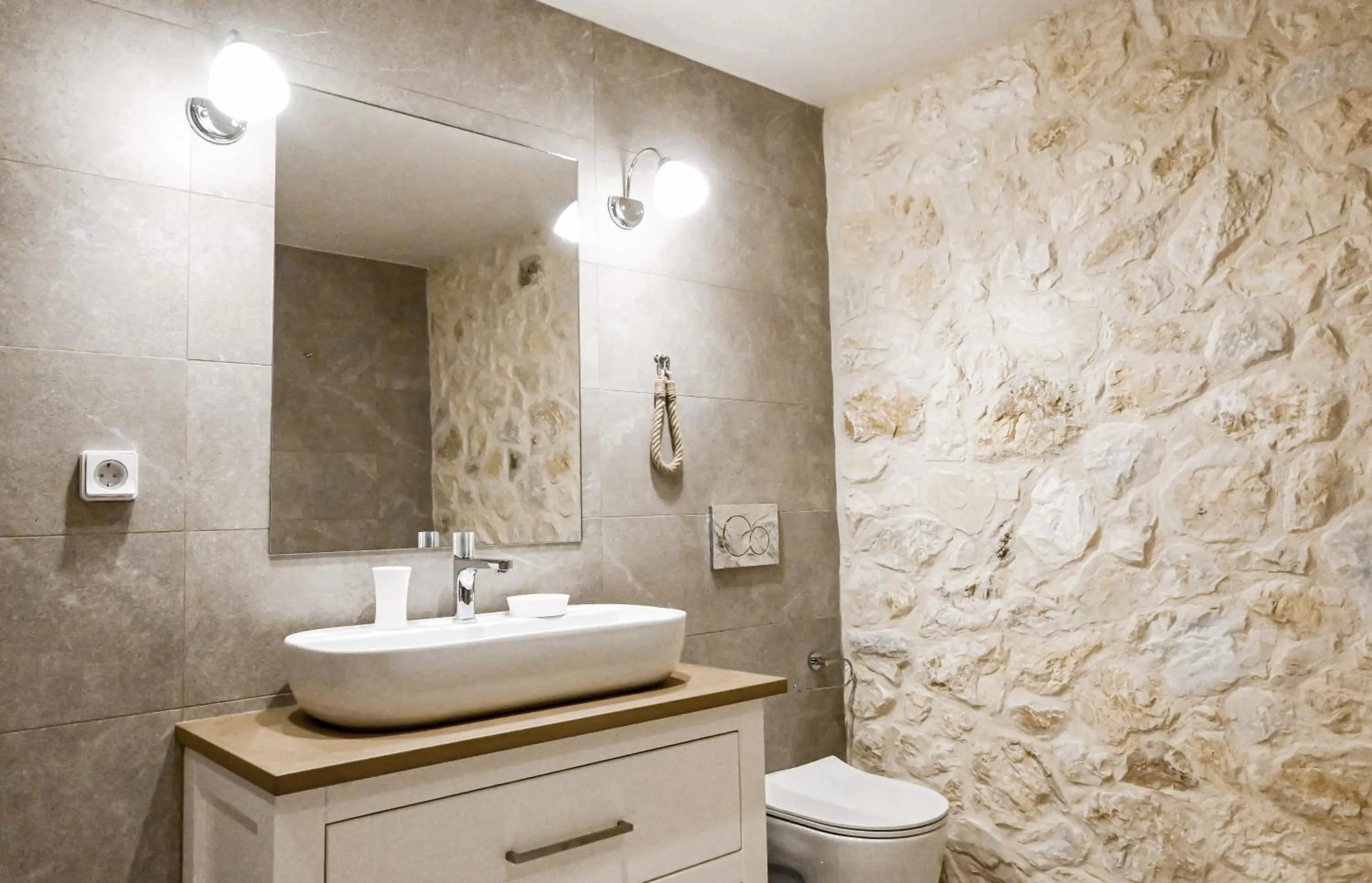 Bathroom in Komody Apartments