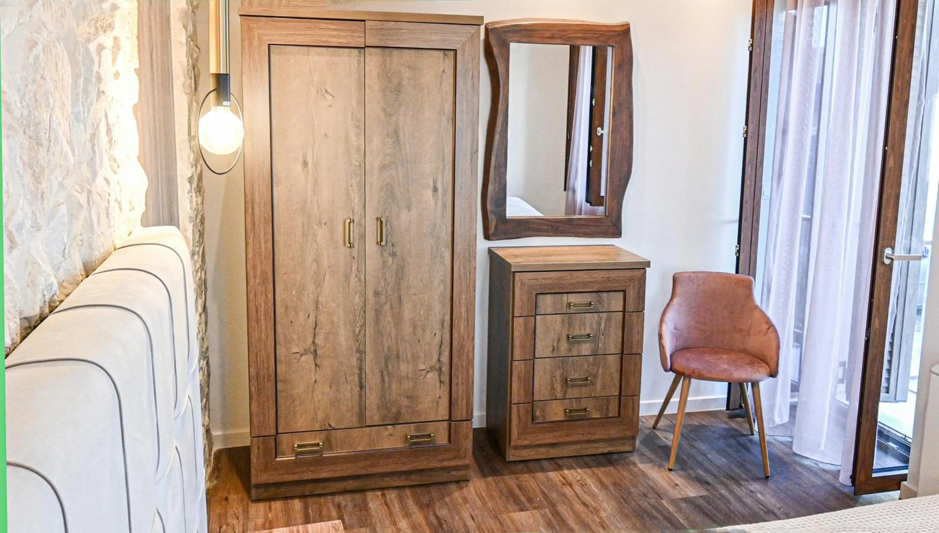 Bedroom in Komody Apartments