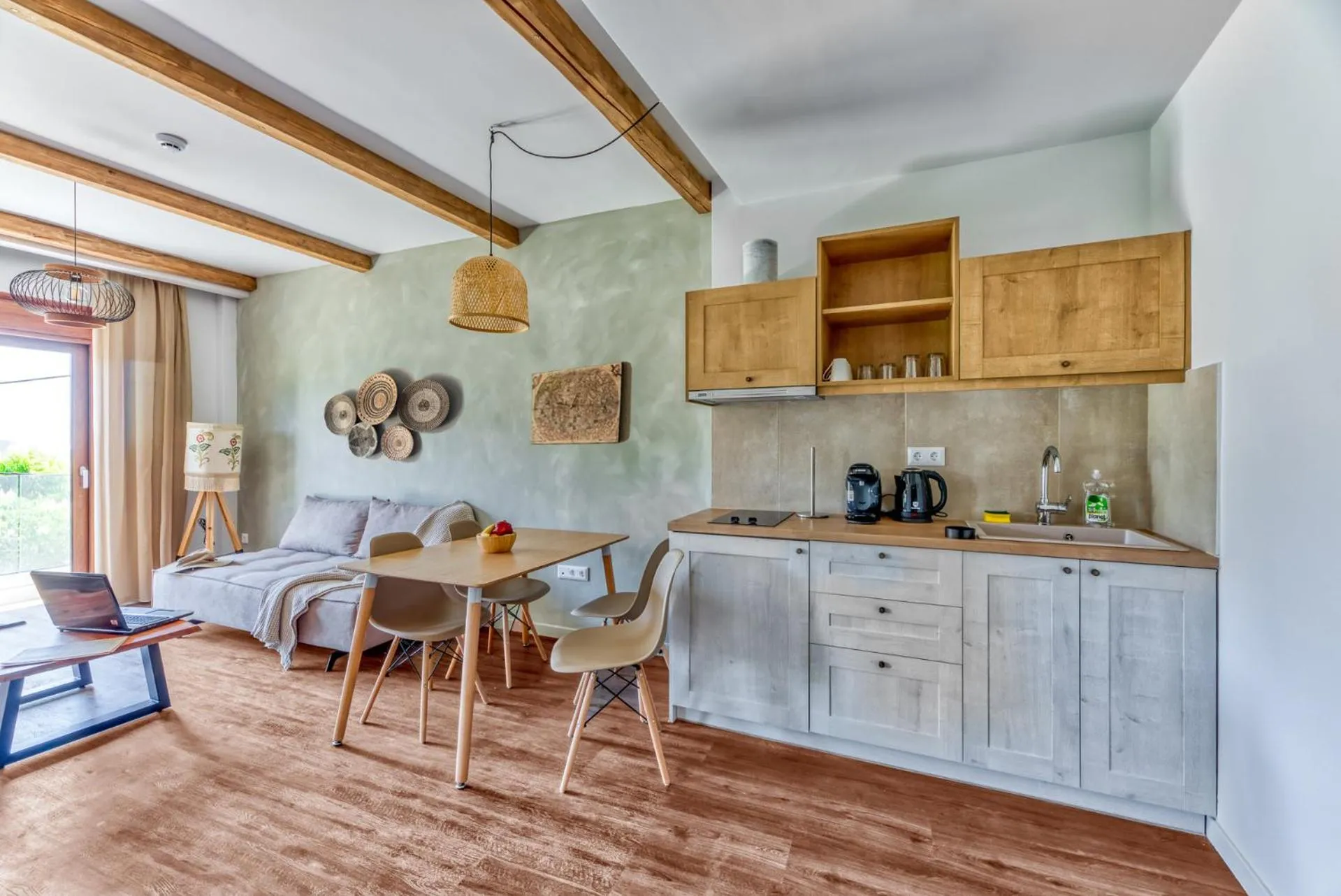 Kitchen or kitchenette in Komody Apartments