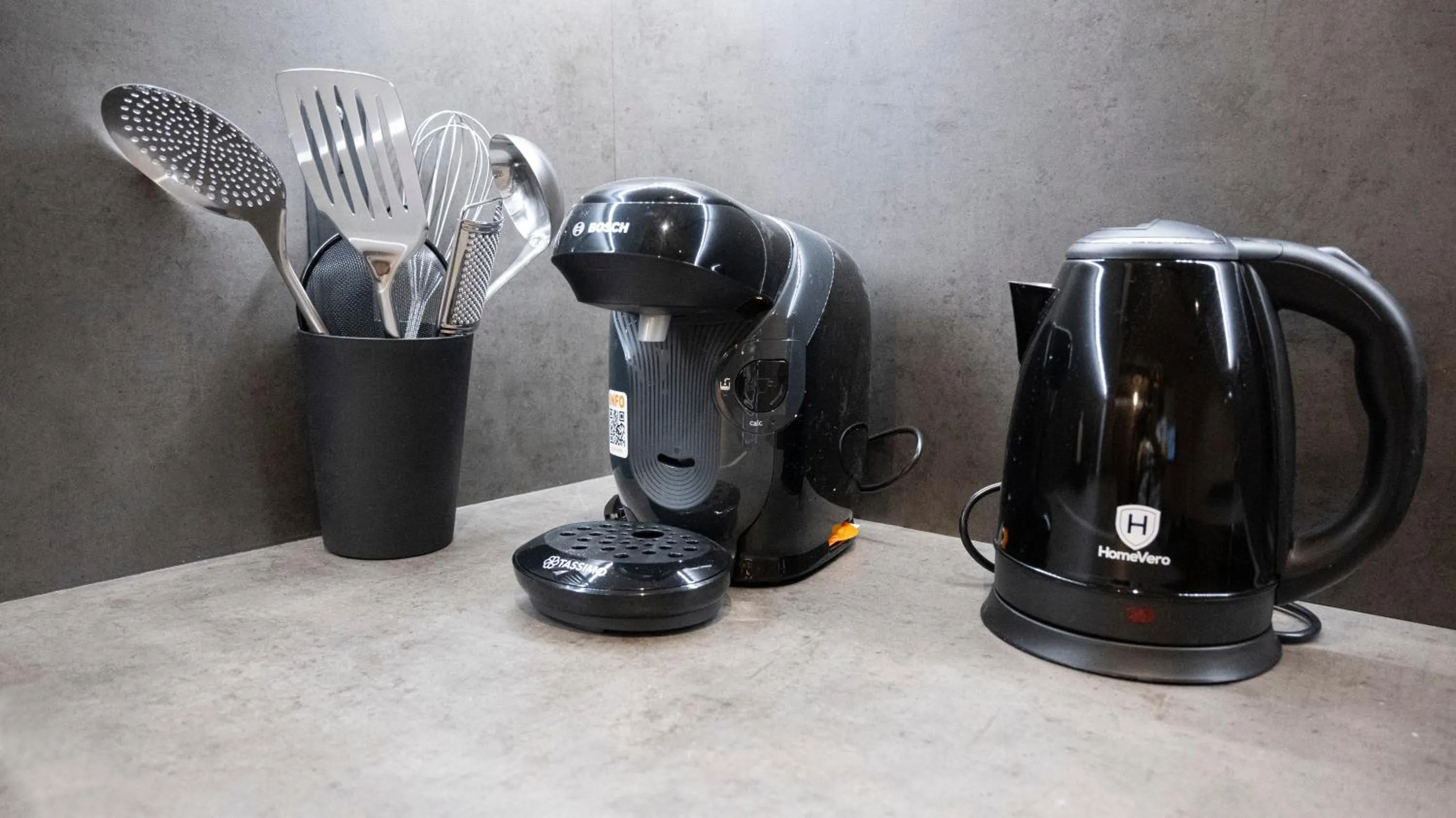 Kitchen or kitchenette in Komody Apartments