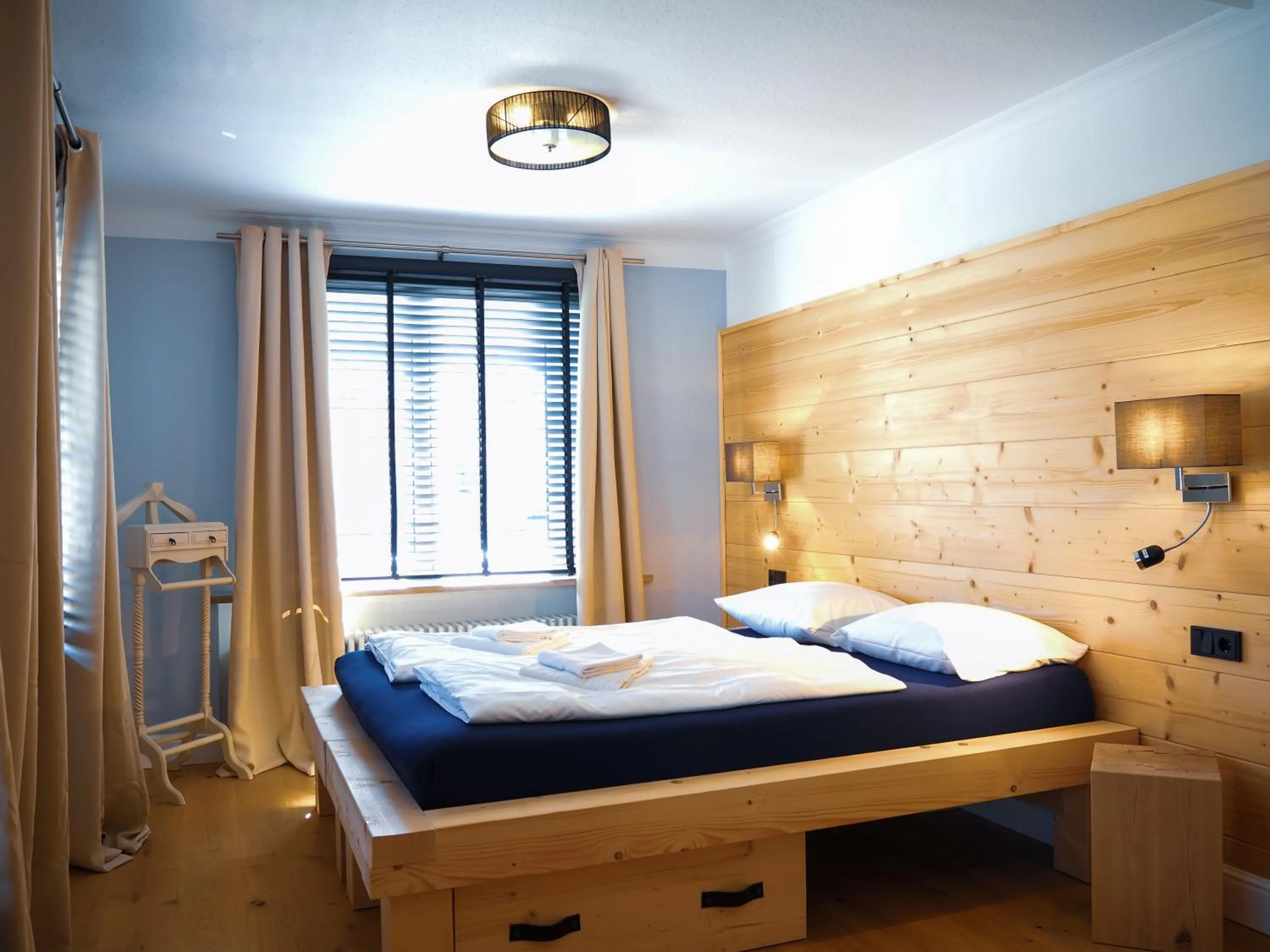 Bedroom, Bed in Design Hotel ALPENLIEBE - - - - Boutique-Flair - - - -